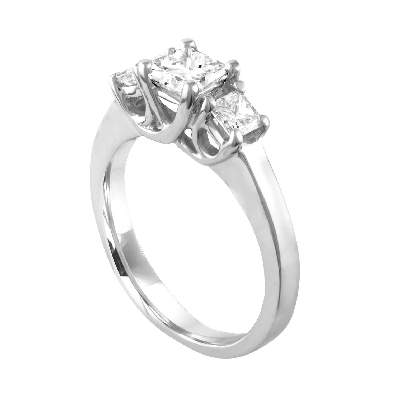 The ring is 14K White Gold
The 3 Diamonds are Princess Cut
The Center stone is 0.70 Carats E/F VVS
The 2 Side stones are 0.50 Carats Total Weight E/F VVS
All 3 diamonds total 1.20 Carats.
The ring weighs 3.5 grams
The ring is a size 5.5, sizable.