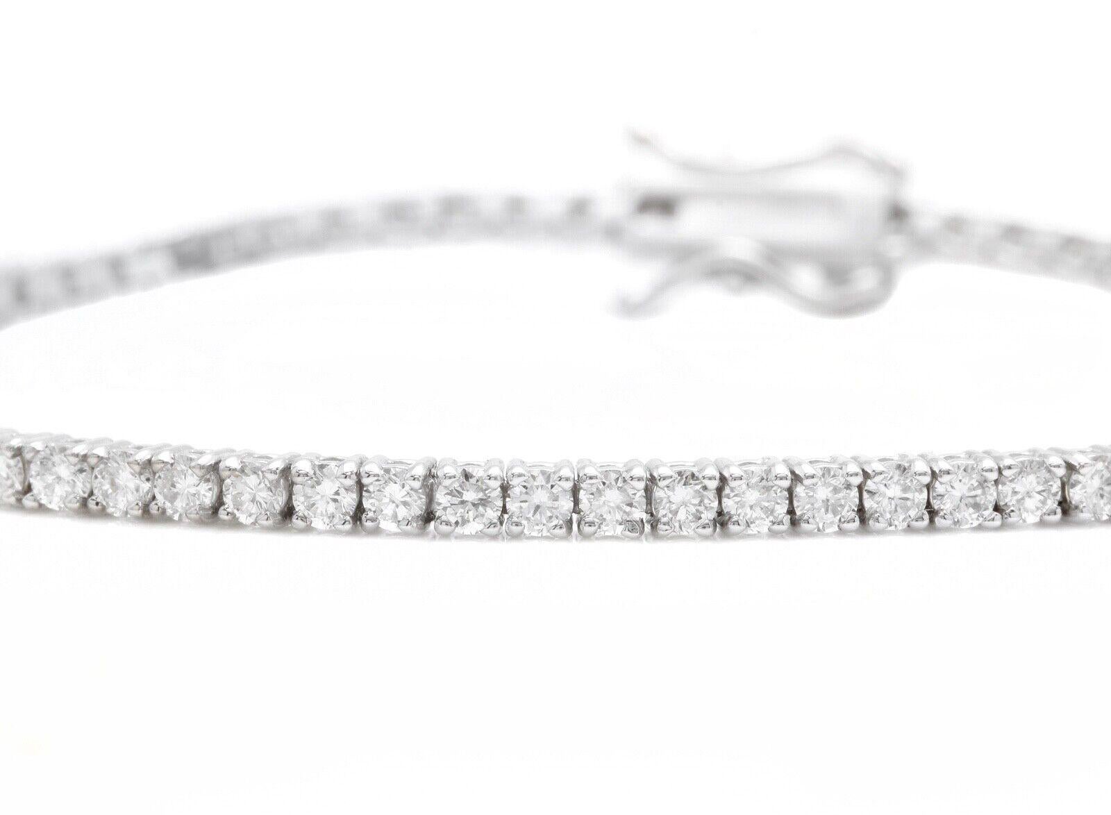 1.20 Carats Stunning Natural Diamond 14K Solid White Gold Bracelet 

Suggested Replacement Value: Approx. $5,500.00

STAMPED: 14K

Total Natural Round Diamonds Weight: Approx. 1.20 Carats (color G-H / Clarity SI)

Bangle Wrist Size is:  7