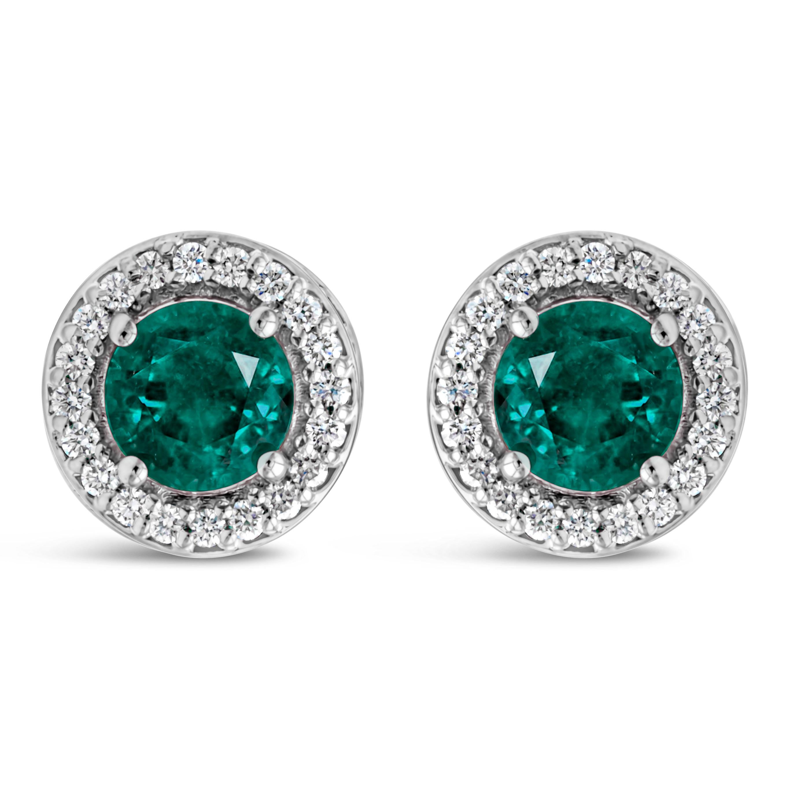 1.20 Carats Total Round Cut Green Emerald and Diamond Halo Stud Earrings For Sale