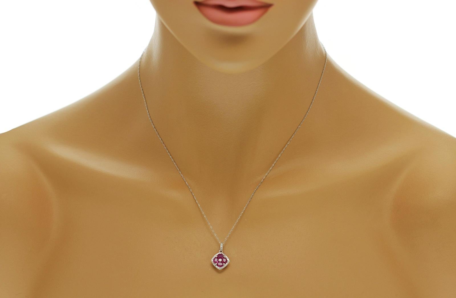 100% Authentic, 100% Customer Satisfaction

Pendant: 12 mm

Chain: 0.5mm

Size: 18 Inches

Metal: 14K White Gold

Hallmarks: 14K

Total Weight: 1.6 Grams

Stone Type: 1.20 CT Natural Ruby &  Diamond 0.15 CT  H  SI1

Condition: New With Tag 