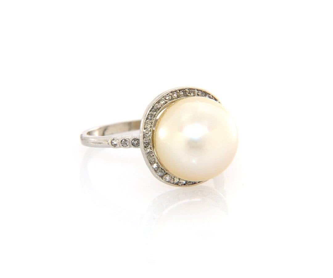 12.0 MM Golden South Sea Pearl and Euro Cut Diamond Ring in Platinum

Golden South Sea Pearl and Euro Cut Diamond Ring
.950 Platinum
Pearl Size: Approx. 12.0 MM
Ring Face Dimensions: Approx. 14.4 MM
Band Width: Approx. 1.6 MM
Ring Size: 8.5