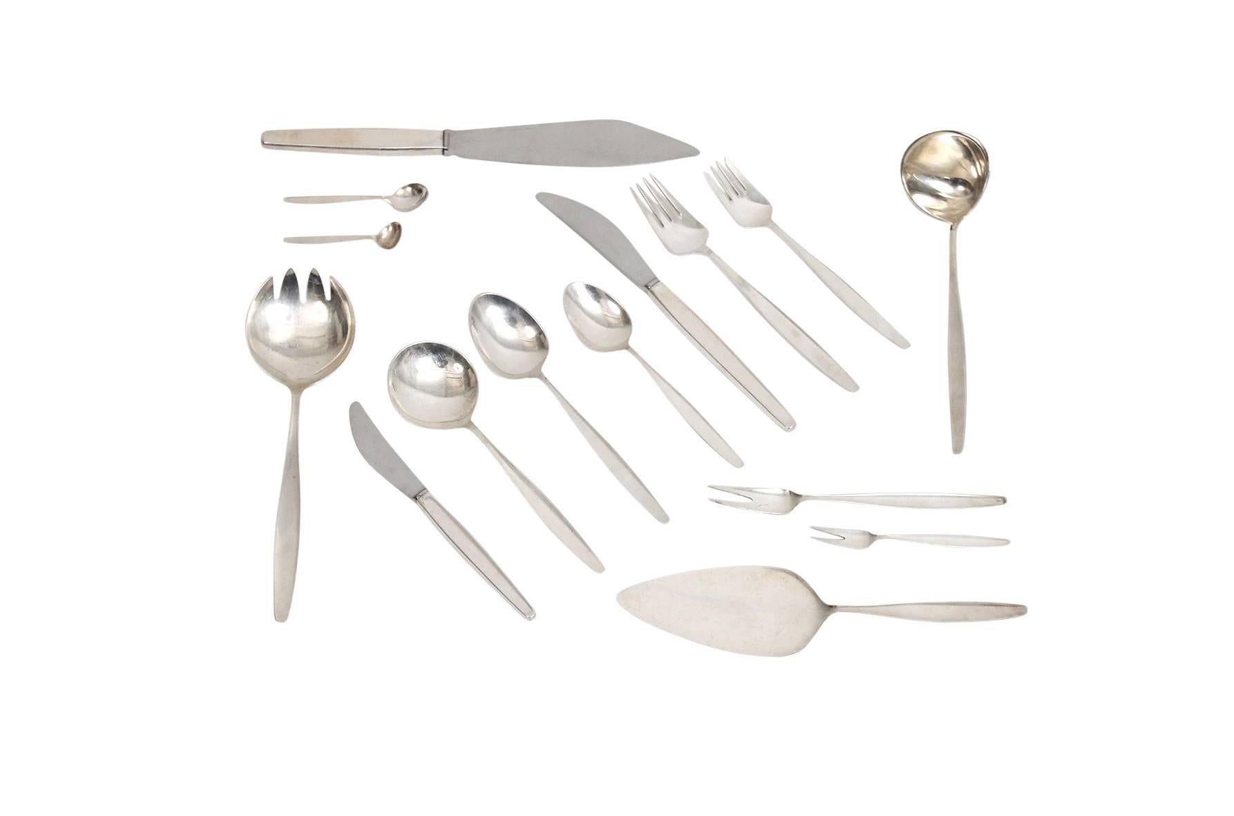 Extensive 120 piece set of sterling silver flatware by Norwegian designer Tias Eckhoff for Georg Jensen. All pieces signed with Jensen's impressed mark. Complete seven piece service for eight or four-piece service for 16 with 14 serving pieces.