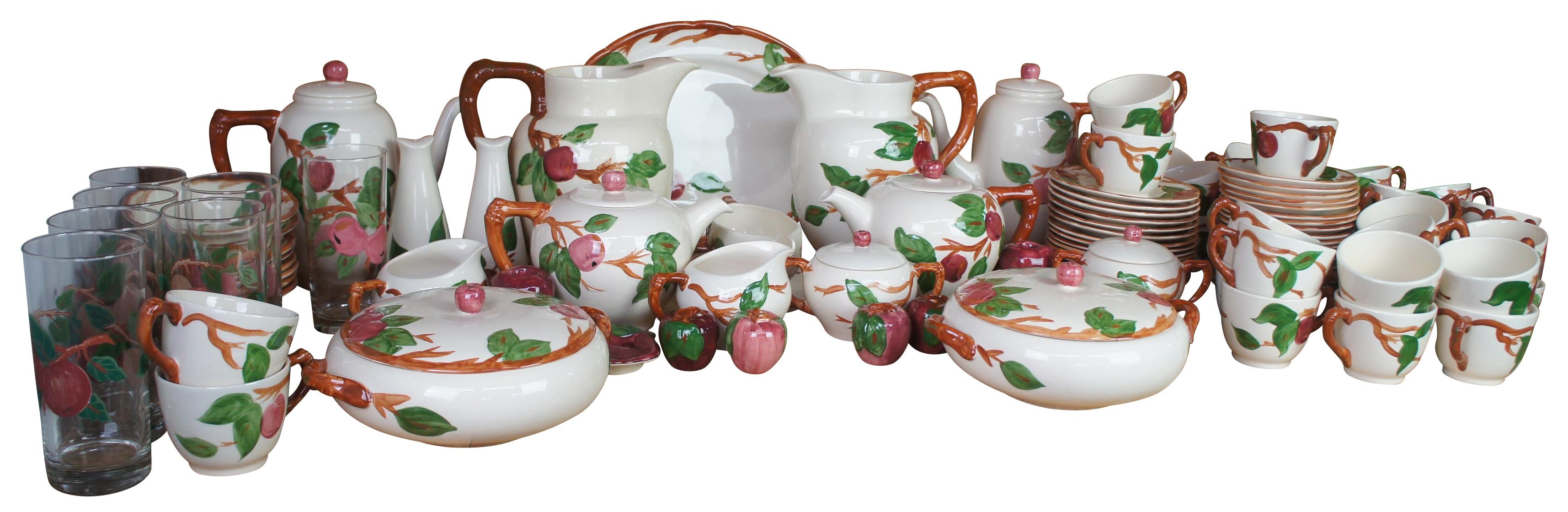 This vintage china set in the apple pattern by Franciscan has doubles of many pieces suitable for large gatherings. Includes 120 hand painted pieces. Made in England and USA

Measures: Platter- 14