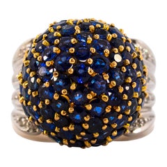 12.00 Carat Blue Sapphire 0.50 Carat White Diamond Yellow Gold Cocktail Ring