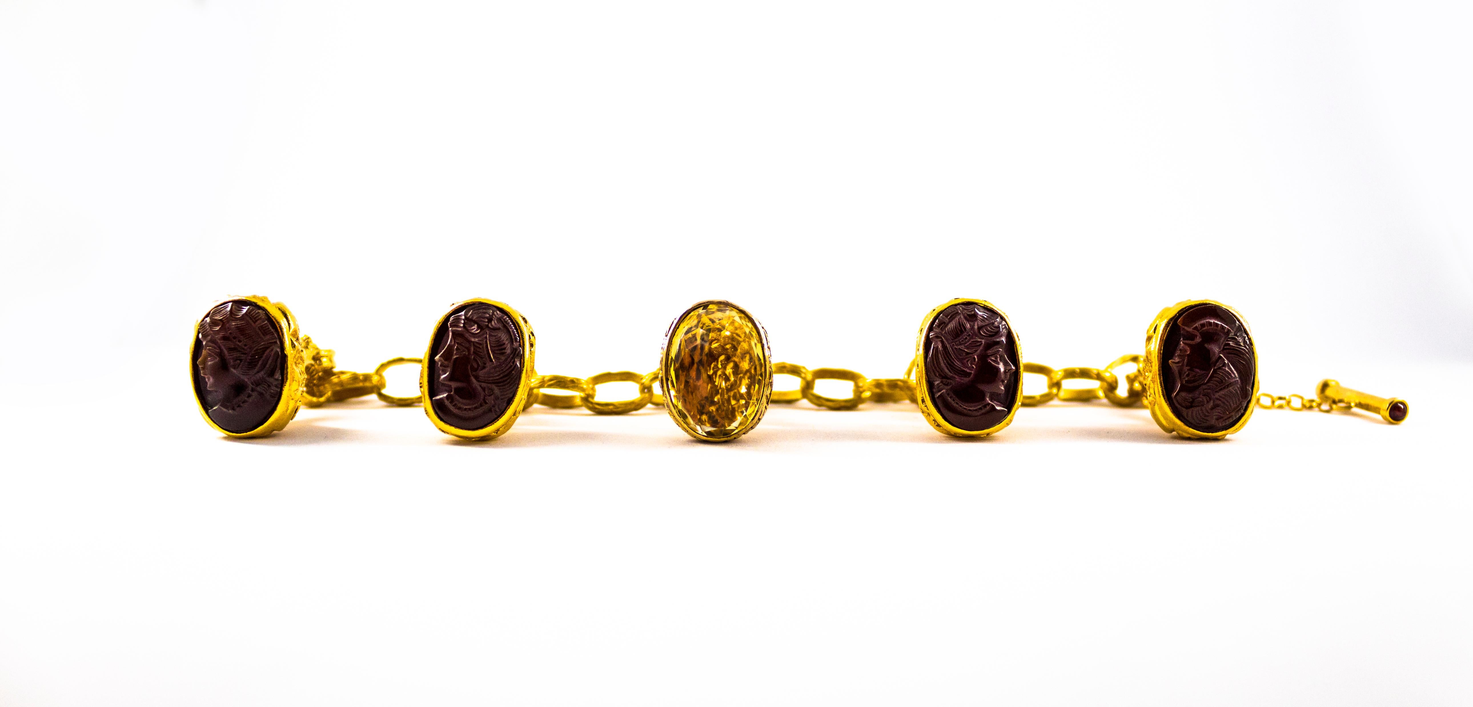 This Bracelet is made of 14K Yellow Gold with 9K Yellow Gold Charms.
This Bracelet has 0.24 Carats of Rubies.
This Bracelet has Carnelian.
This Bracelet has a 12.00 Carats Citrine.

We're a workshop so every piece is handmade, customizable and