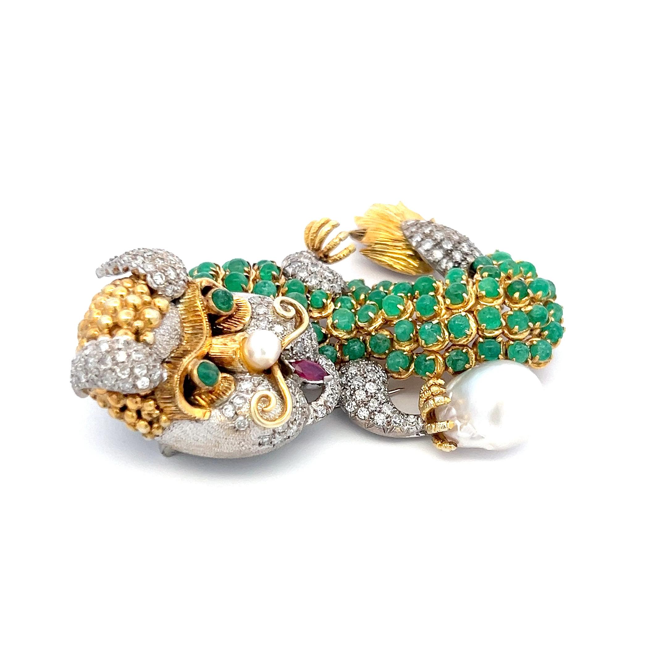 Title:
12.00 Carat Emerald 8.00 Carat Round Brilliant G SI1 Diamond 2.00 Carat Pearl 0.20 Carat Marquis Shape Ruby 14 Karat Two Tone Gold Pin Brooch
Style:
Pin
Metal:
14 Karat Two Tone Gold
Gemstone 1:
8 Carat Diamond
Number of