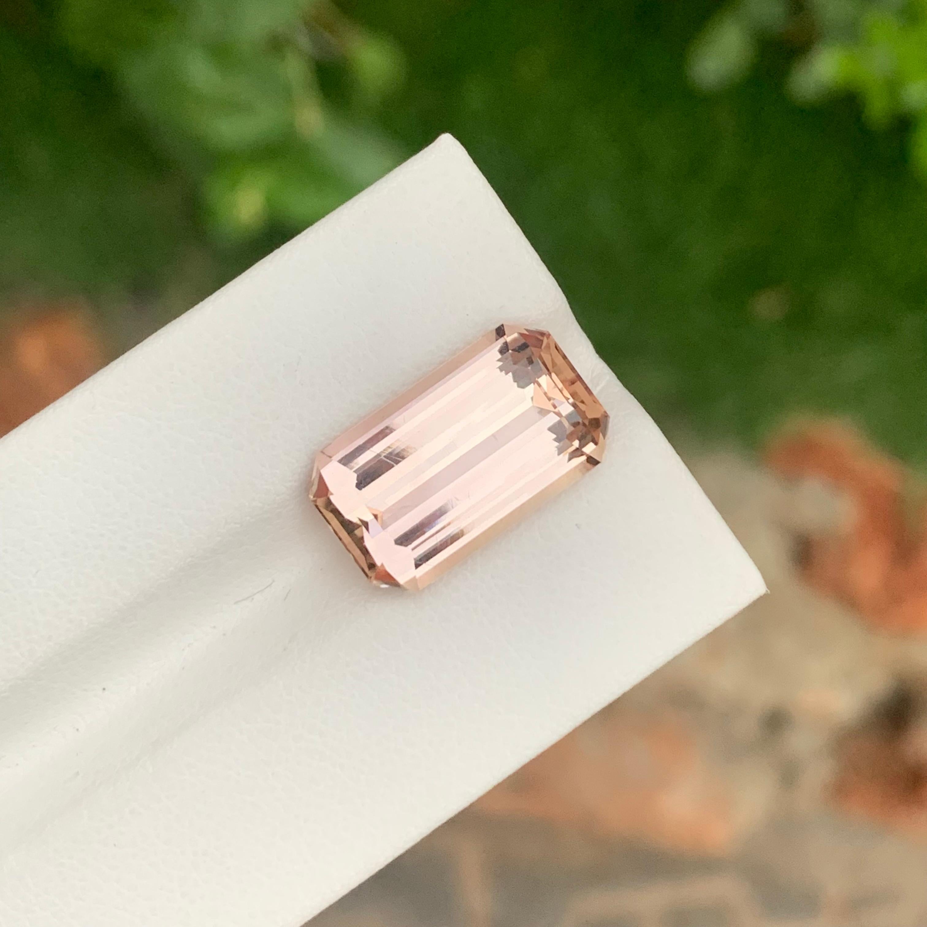 Emerald Cut 12.00 Carat Loupe Clean Natural Loose Imperial Topaz Katlang Mine For Sale
