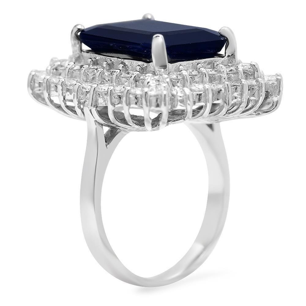 12.00 Carats Natural Blue Sapphire and Diamond 14K Solid White Gold Ring

Total Blue Sapphire Weight is: Approx. 10.00 Carats

Natural Sapphire Measures: Approx. 15.00 x 12.00mm

Sapphire treatment: Diffusion

Natural Round Diamonds Weight: Approx.