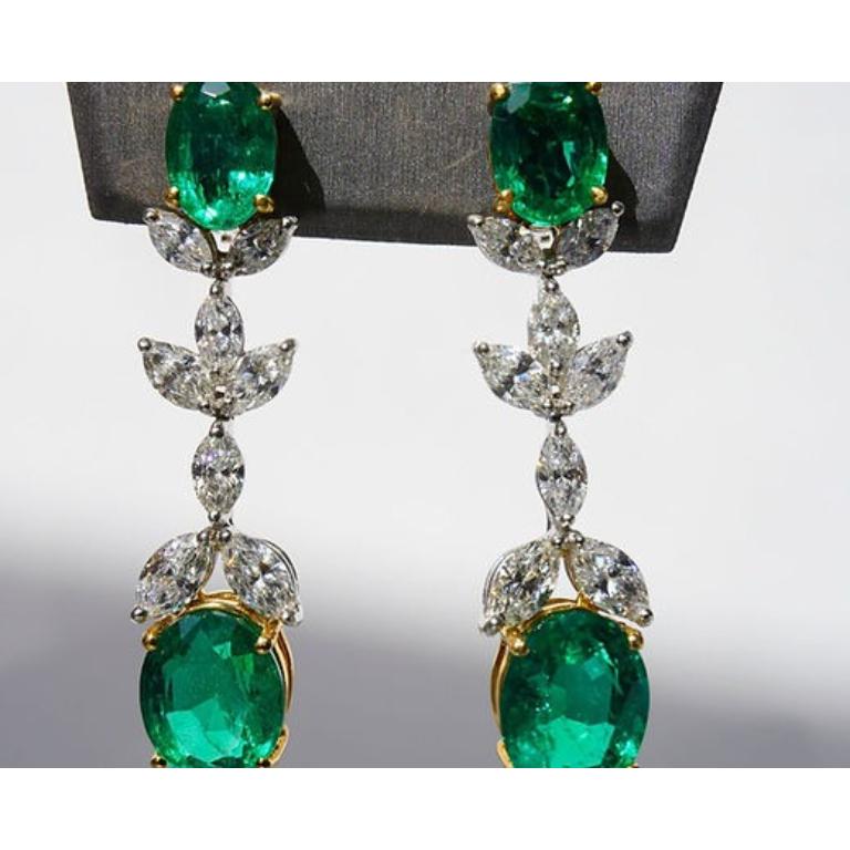 Emerald Weight: 12.00 ct, Diamond Weight: 4.60 ct, Metal: Platinum, Gold Weight: 14.84 gm, Length: 2 Inches, Shape: Oval, Color: Vivid Green, Origin: Zambia, Hardness: 7.5-8, Birthstone: May, CD Certified