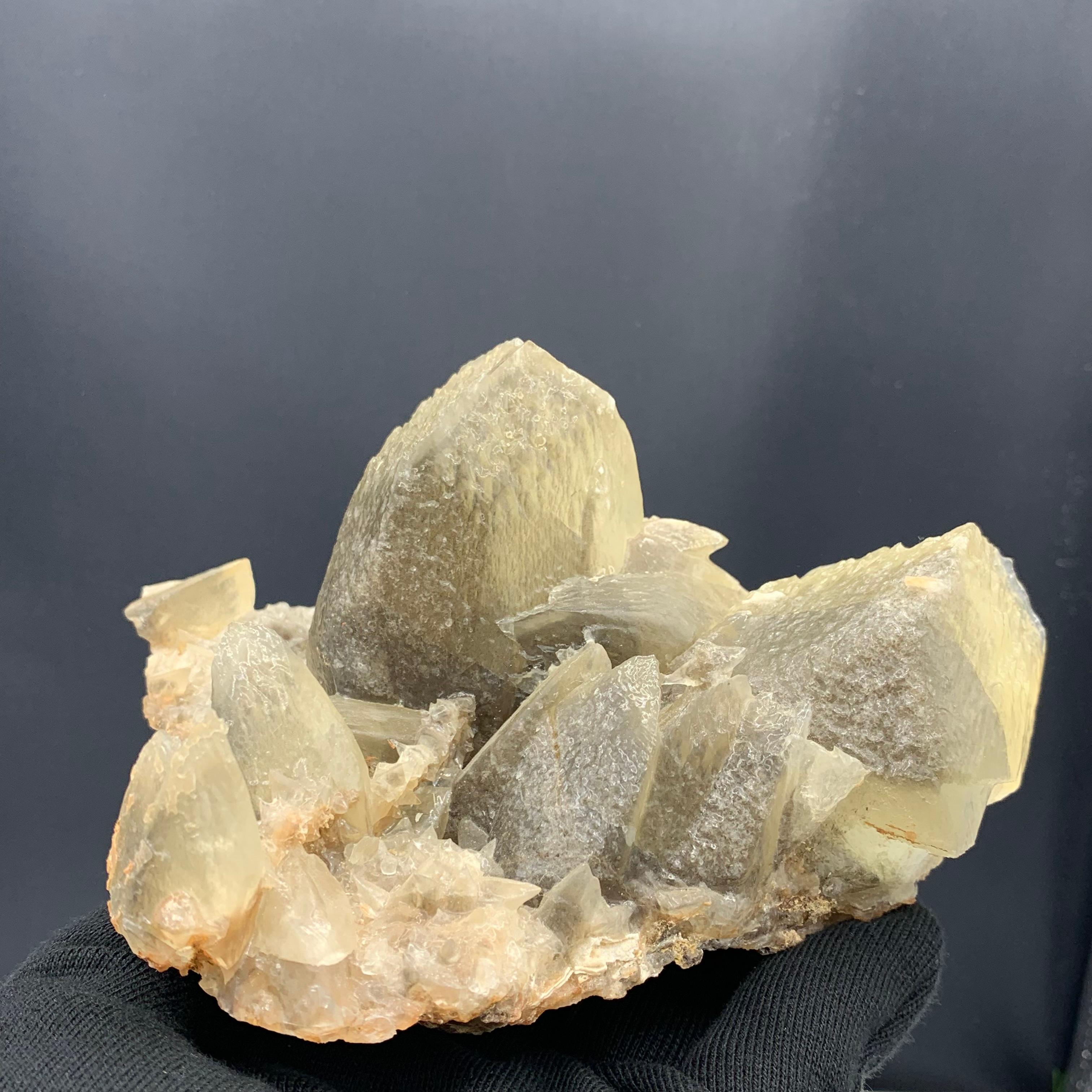 1200 Plus Gram Gorgeous Calcite Specimen From Balochistan, Pakistan 
Weight: 1200+ gram 
Dimension: 8.8 x 15.1 x 11.7 Cm
Origin: Balochistan, Pakistan 

Calcite crystal's properties make it one of the most widely used minerals. It is used as a