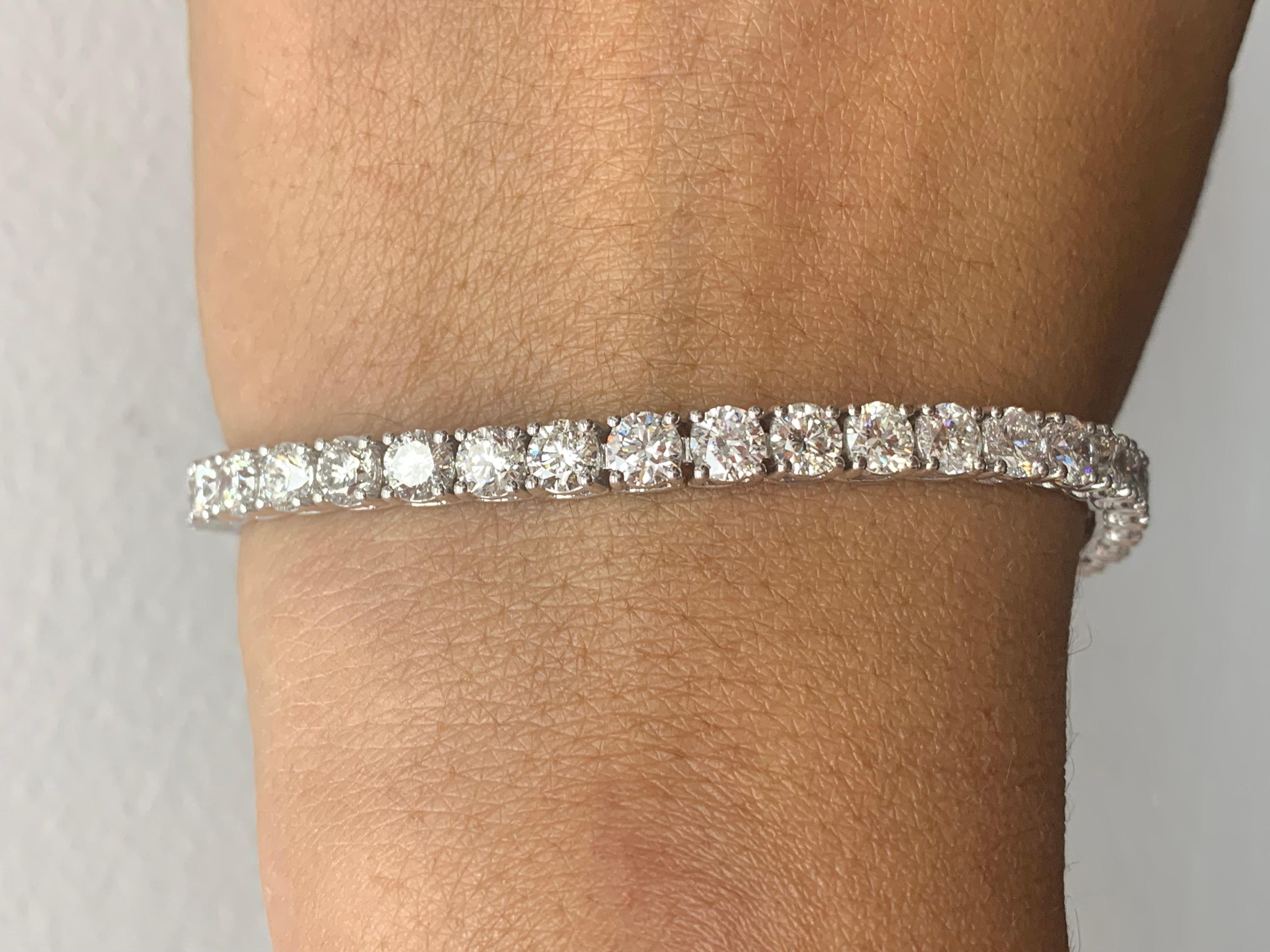 A classic tennis bracelet style is showcasing a row of round brilliant diamonds, set in a polished 14k white gold mounting. 39 Diamonds weigh 12.01 carats and are approximately GH color, SI1 clarity.

Style is available in different price ranges.