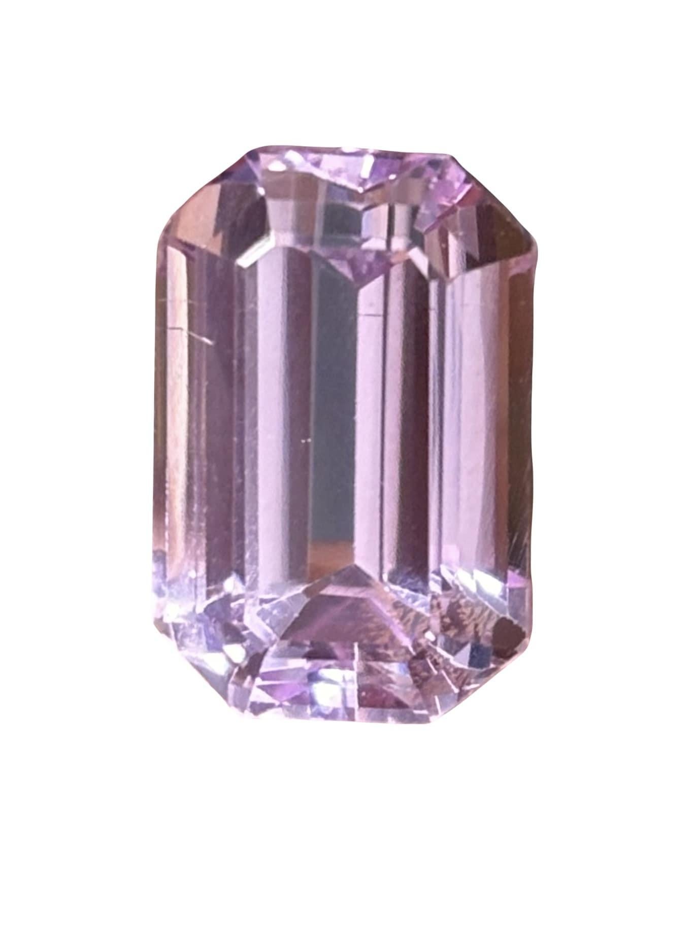 A massive, gorgeous 12.01 Carat Kunzite stone that is beautiful shade of pink. It is completely natural and of good quality. The kunzite piece is cut into perfection in a cushion-cut shape.

The measurements of the Kunzite are 15.28mm x 10.16mm x