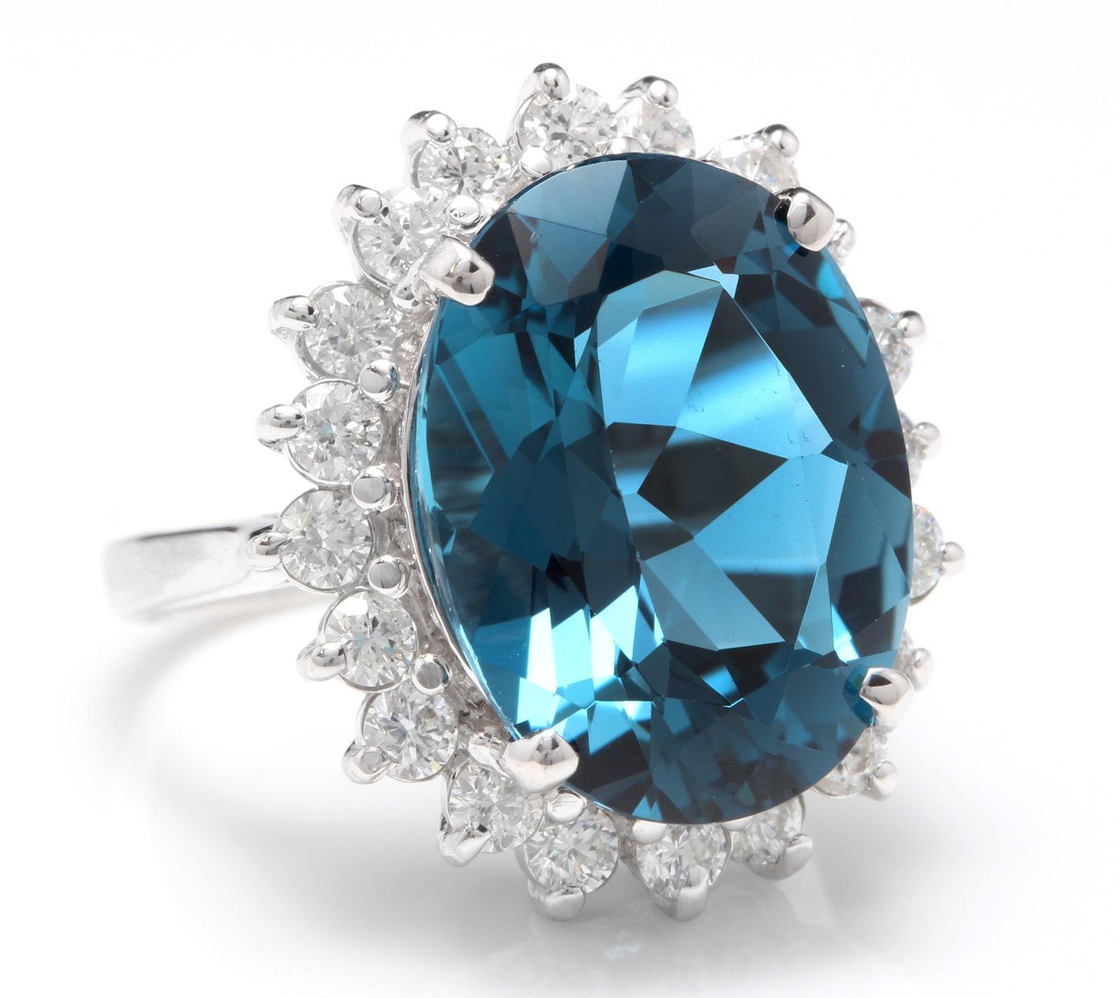 12.05 Carats Impressive Natural London Blue Topaz and Diamond 14K Solid White Gold Ring

Total Natural Oval Topaz Weight is Approx. 11.00 Carats

Topaz Measures: Approx. 16.00 x 12.00mm

Natural Round Diamonds Weight: Approx. 1.05 Carats (color G-H