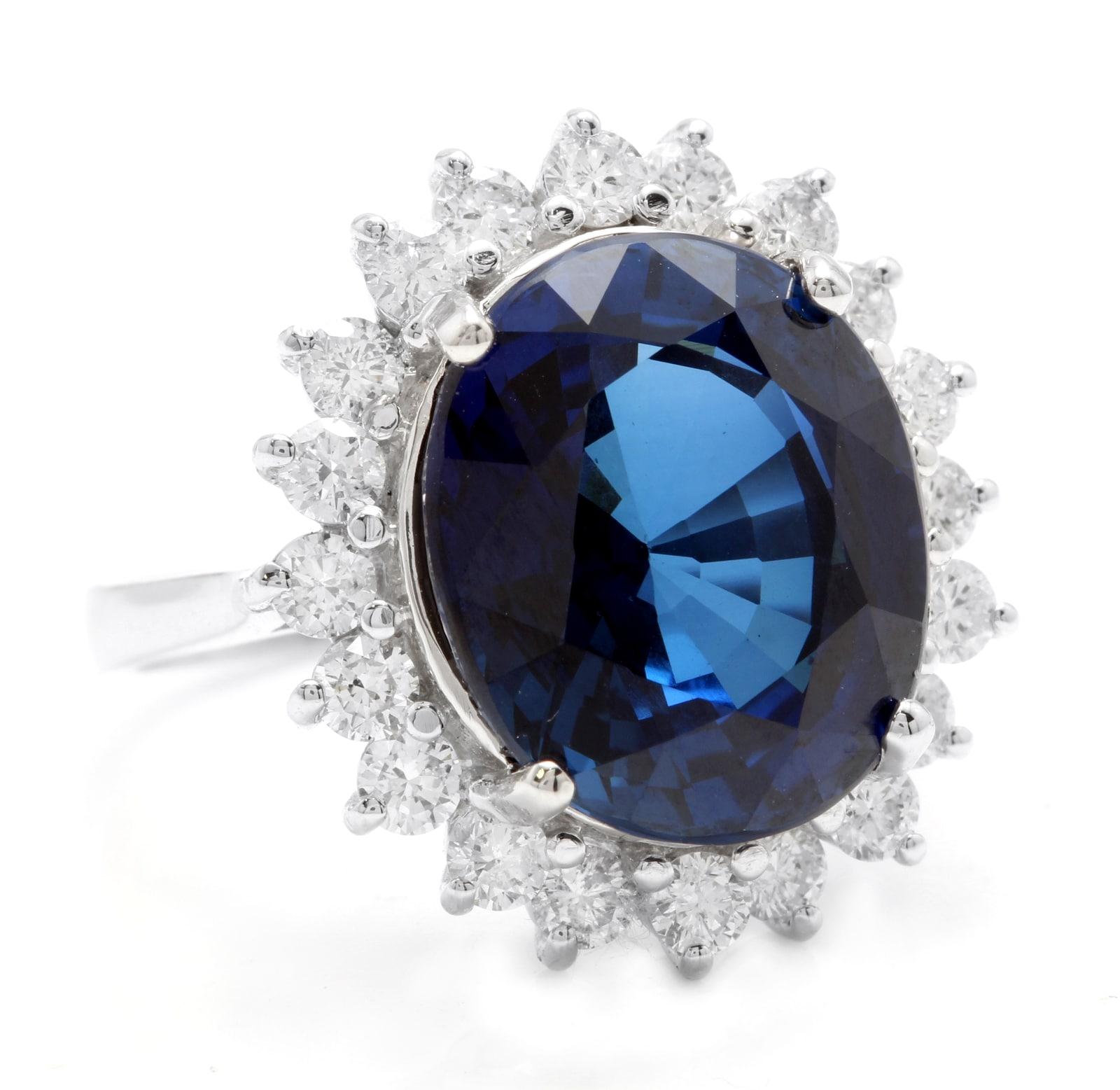 12.05 Carats Ceylon Blue Sapphire and Natural Diamond 14K Solid White Gold Ring

Suggested Replacement Value $5,500.00

Total Blue Sapphire Weight is: 11.00 Carats (Lab Created)

Sapphire Measures: Approx. 14 x 12mm 

Natural Round Diamonds Weight: