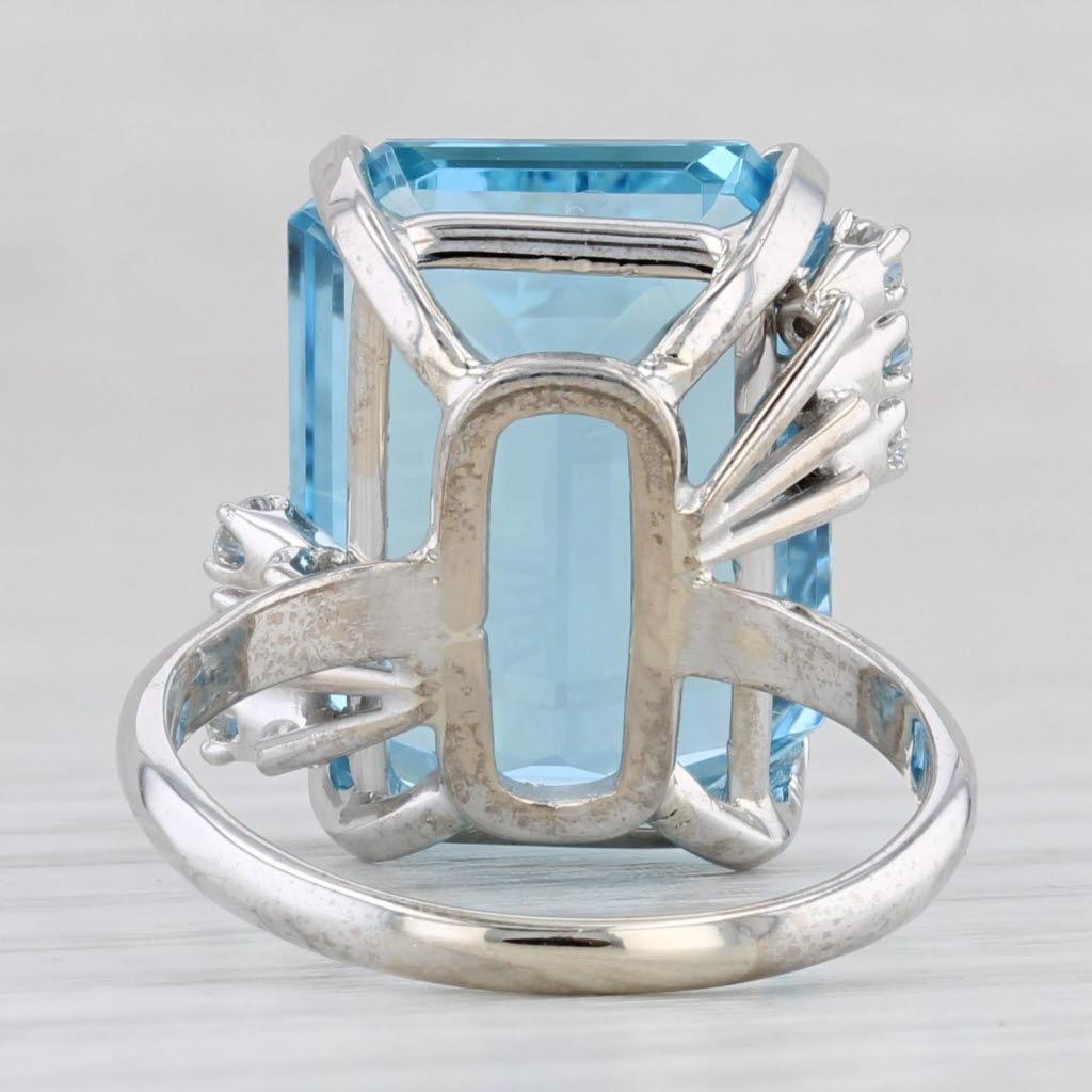 Gemstone Information:
- Natural Aquamarine -
Carats - 11.90ct (12.3 x 16.2 mm 
Cut - Emerald
Color - Aqua / Light Blue
Treatment - Heated

- Natural Diamonds -
Total Carats - 0.16ctw
Cut - Round Brilliant
Color - F - H
Clarity - VS2 - SI1

Metal: