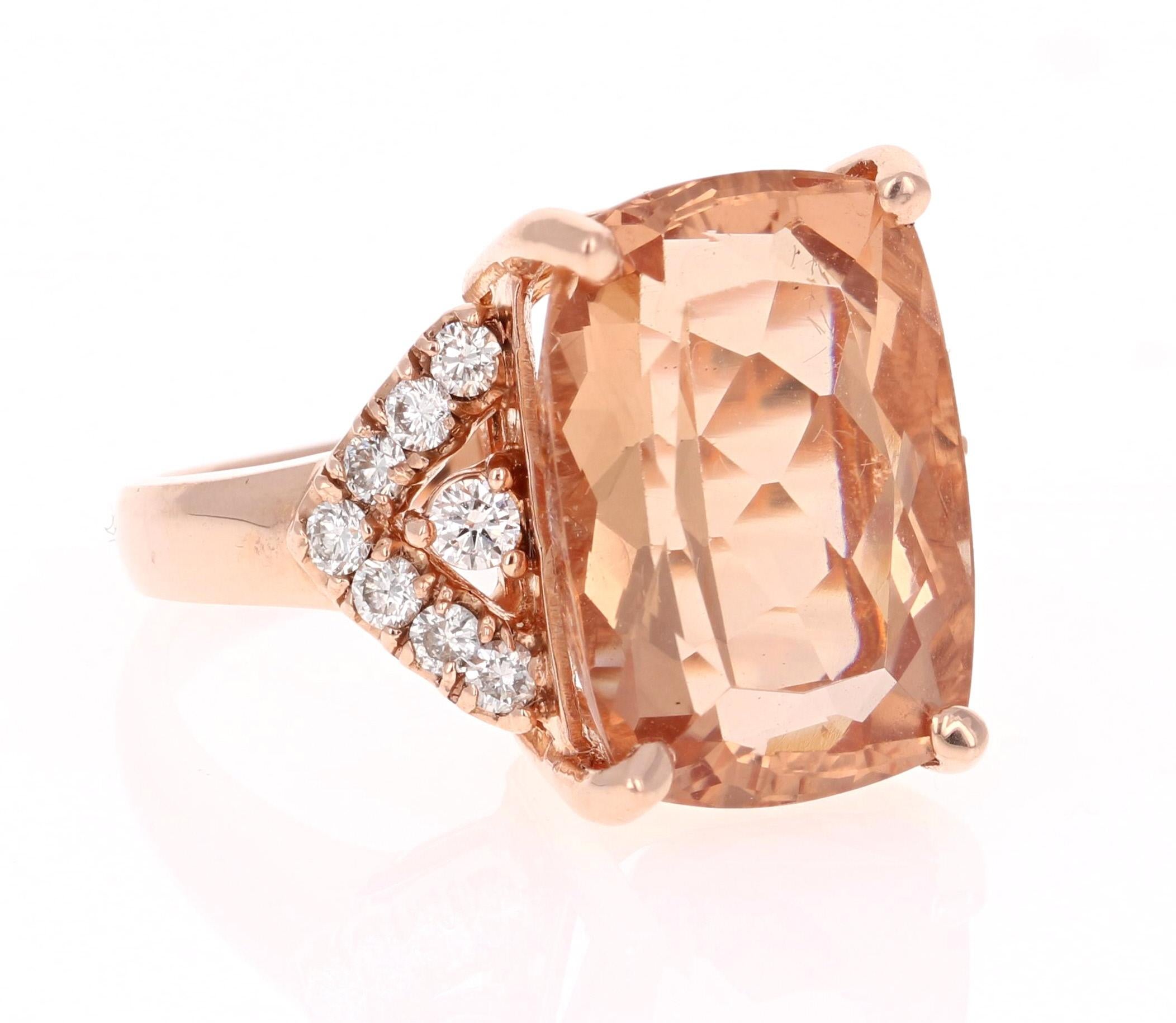 This gorgeous, classy and large Morganite Ring has a 11.54 Carat Rectangular Cushion Cut Morganite as its center and has 16 Round Cut Diamonds that weigh 0.54 carats. The clarity and color of the diamonds are VS-H.   The total carat weight of the