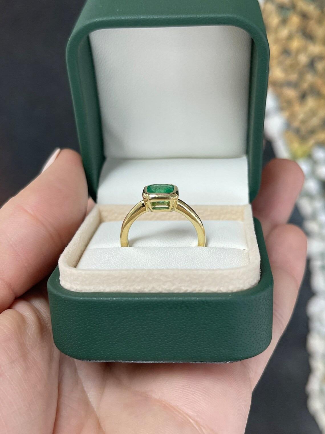 1.20ct 18K Vivid Green Emerald Cut Emerald Solitaire Gold Bezel Right Hand Ring For Sale 1
