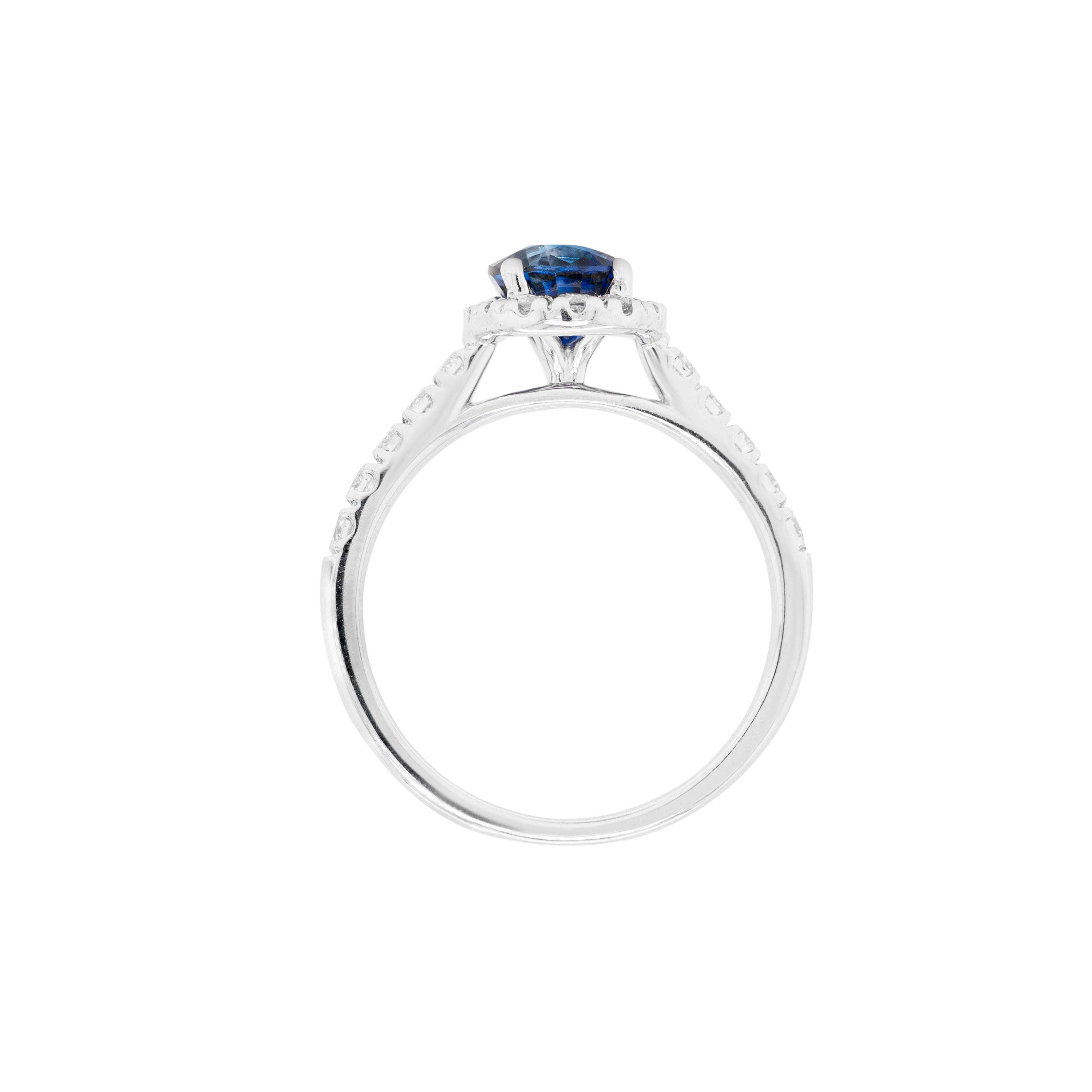 Modern 1.20ct Blue Sapphire and Diamond 18 Carat White Gold Halo Engagement Ring For Sale