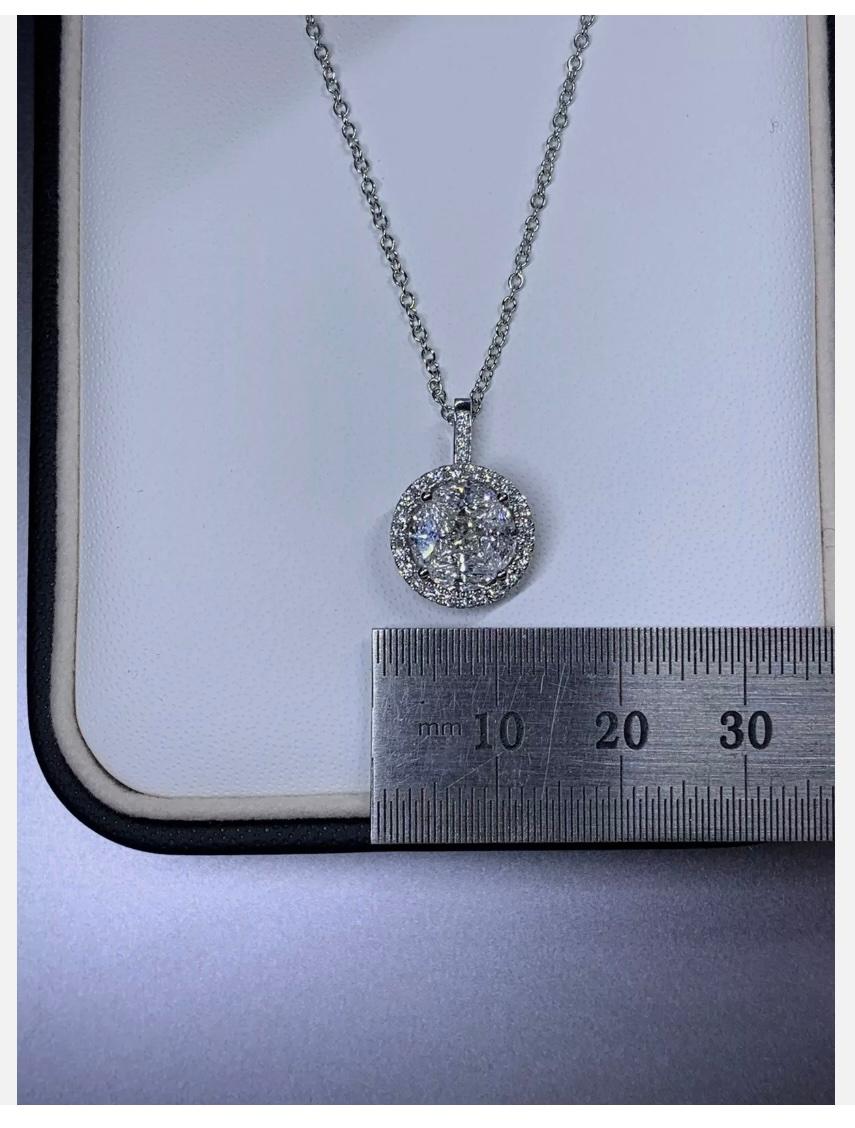 1.20ct Diamond transfornative solitaire engagement ring and pendant in 18ct white gold
1.20ct Round and marquise diamond engagement ring pendant in 18k white gold.

Gorgeous marquise, princess and round diamond engagement ring with diamond halo that