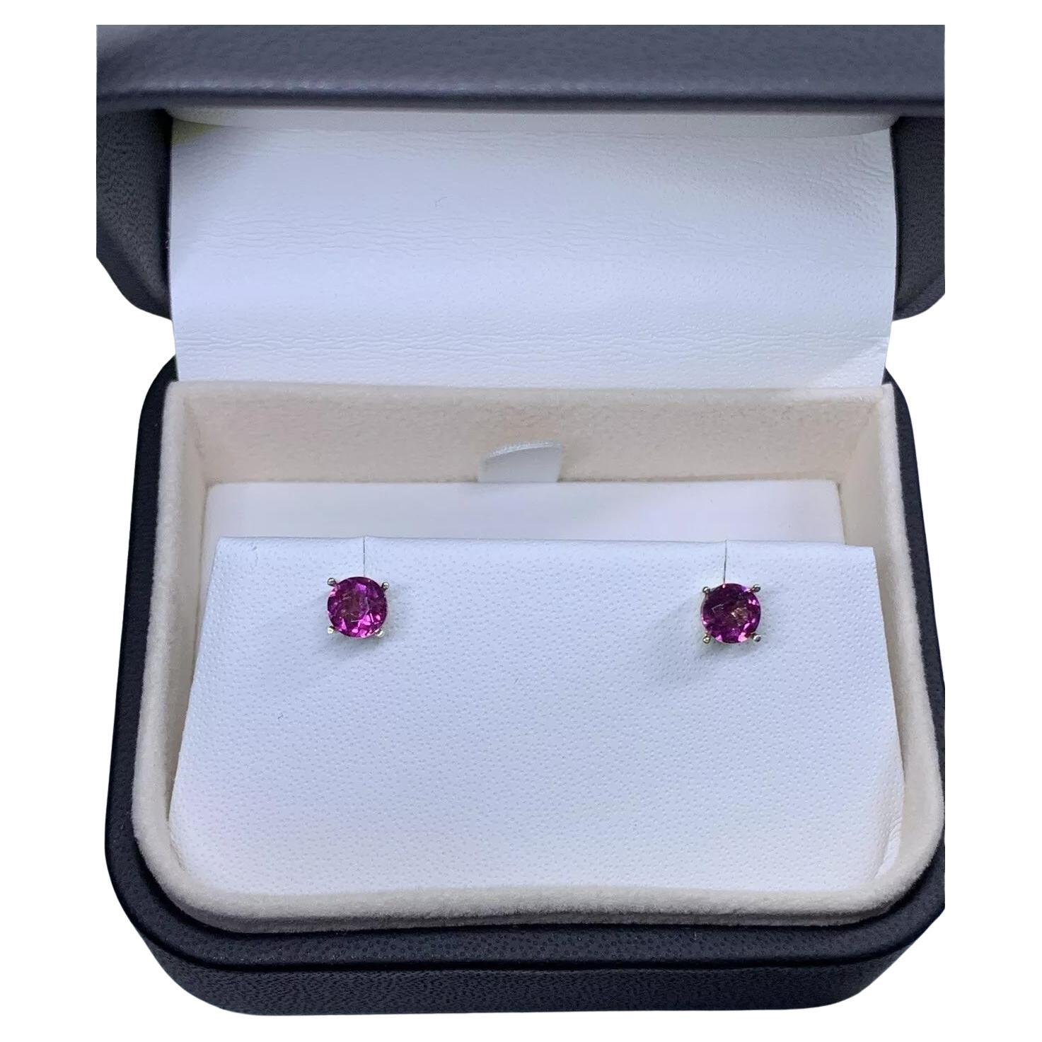 1.20ct Garnet pink round studs earrings in 9ct white gold.