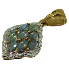 Pendentif Vintage en saphir vert de 1,20ct en or rose et blanc 9K.