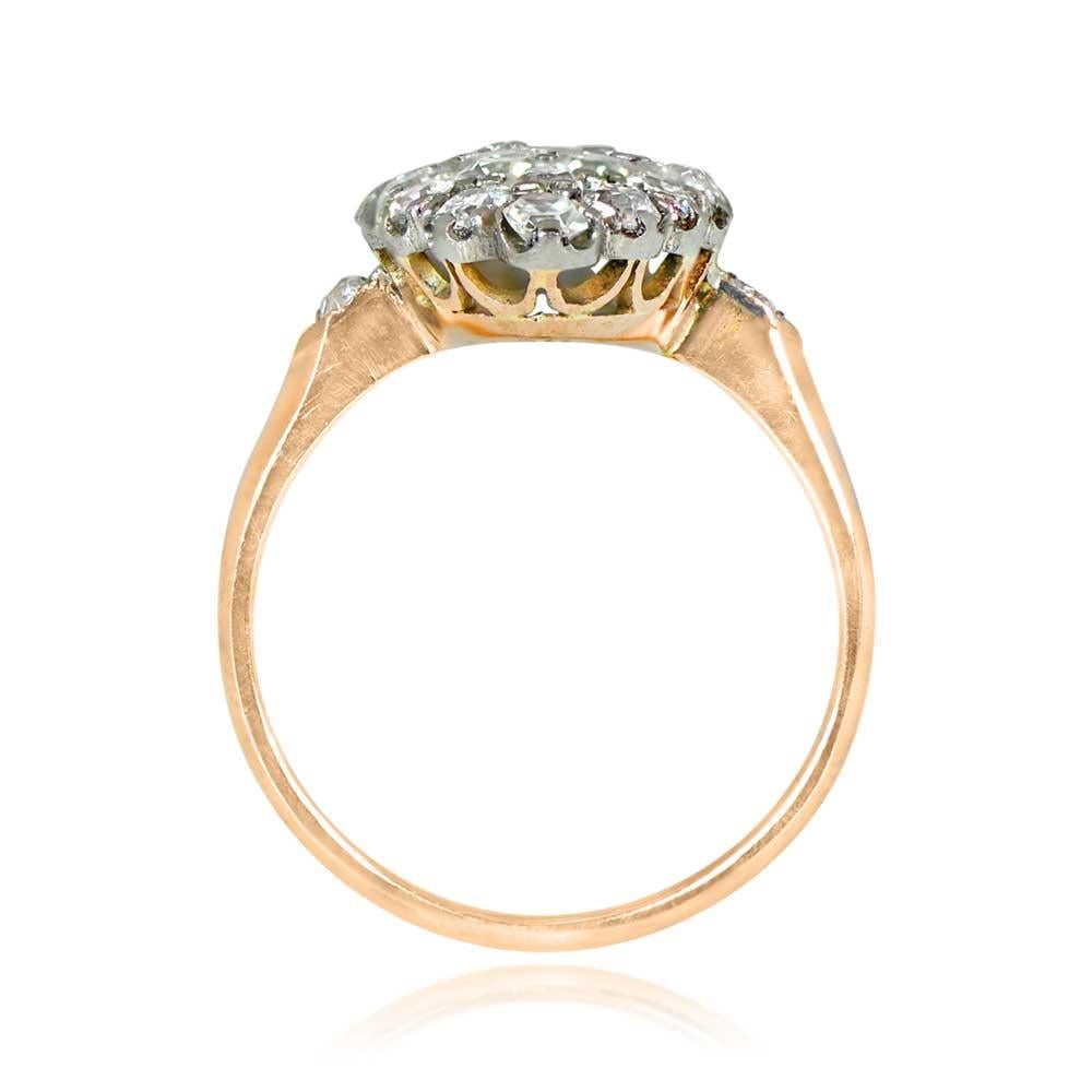 Elegant Navette Diamond Ring: A striking design with a marquise-shaped top adorned by old European cut diamonds, totaling around 1.20 carats. Diamonds are I-J color and VS1-SI1 clarity. Handcrafted in platinum and 18k yellow gold, echoing the