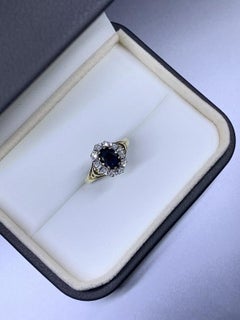 1.20ct Sapphire diamond halo antique engagement ring in 9ct yellow gold.