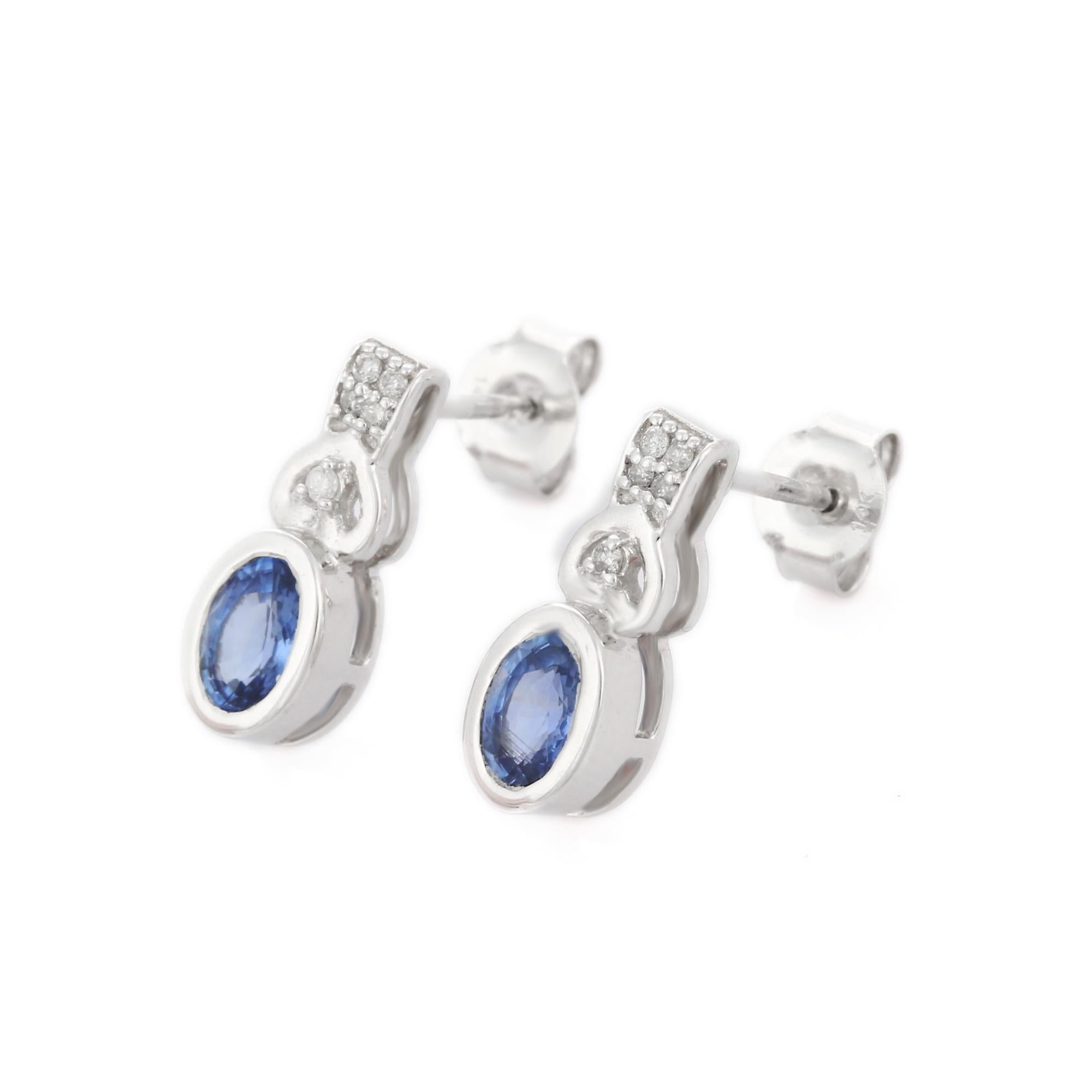 Studs create a subtle beauty while showcasing the colors of the natural precious gemstones and illuminating diamonds making a statement.

Oval cut blue sapphire studs in 14K gold. Embrace your look with these stunning pair of earrings suitable for