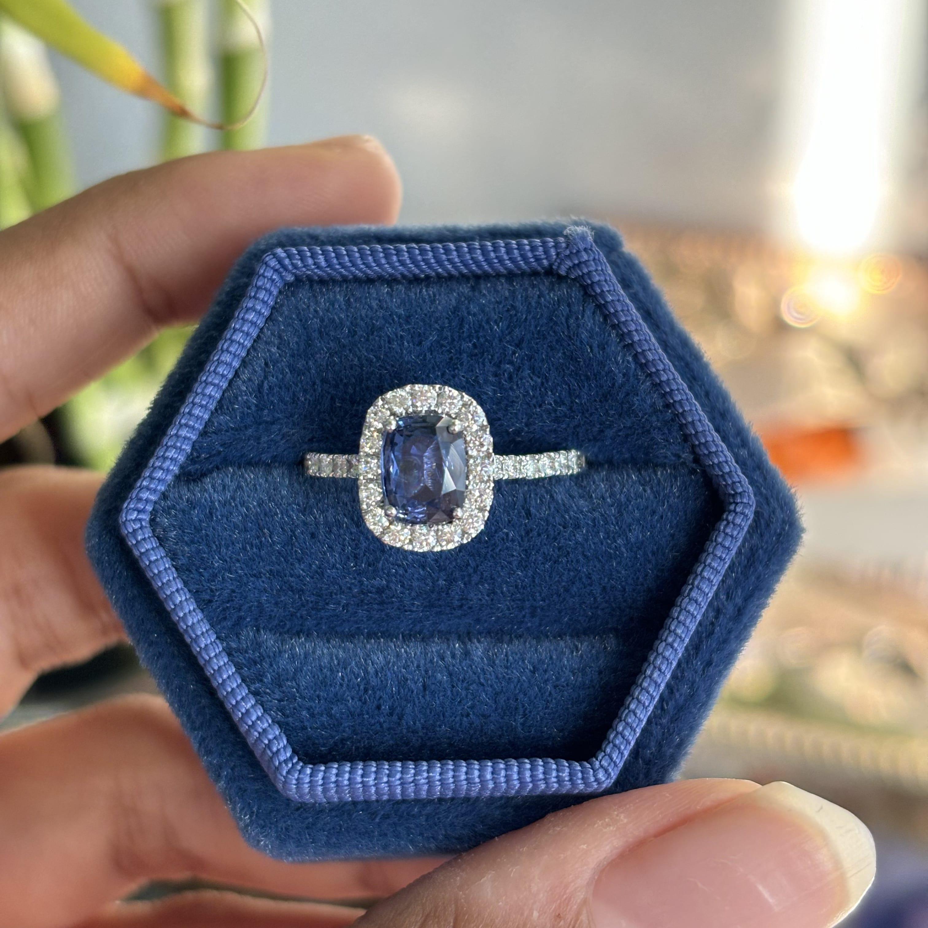 Radiating timeless elegance, this extraordinary piece has been specially designed to accentuate the mesmerizing beauty of this mesmerizing cornflower blue sapphire.

The sapphire, a regal emblem of rich sophistication, boasts a captivating
