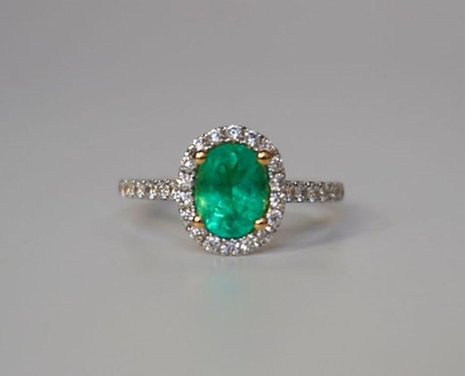 Emerald Weight: 1.21 ct, Measurements 8x6 mm, Diamond Weight: 0.46 ct, Metal: 18K White Gold (yellow gold prongs), Gold Weight: 3.27 gm, Ring Size: 7, Shape: Oval, Color: Light Green, Hardness: 7.5-8, Birthstone: May
