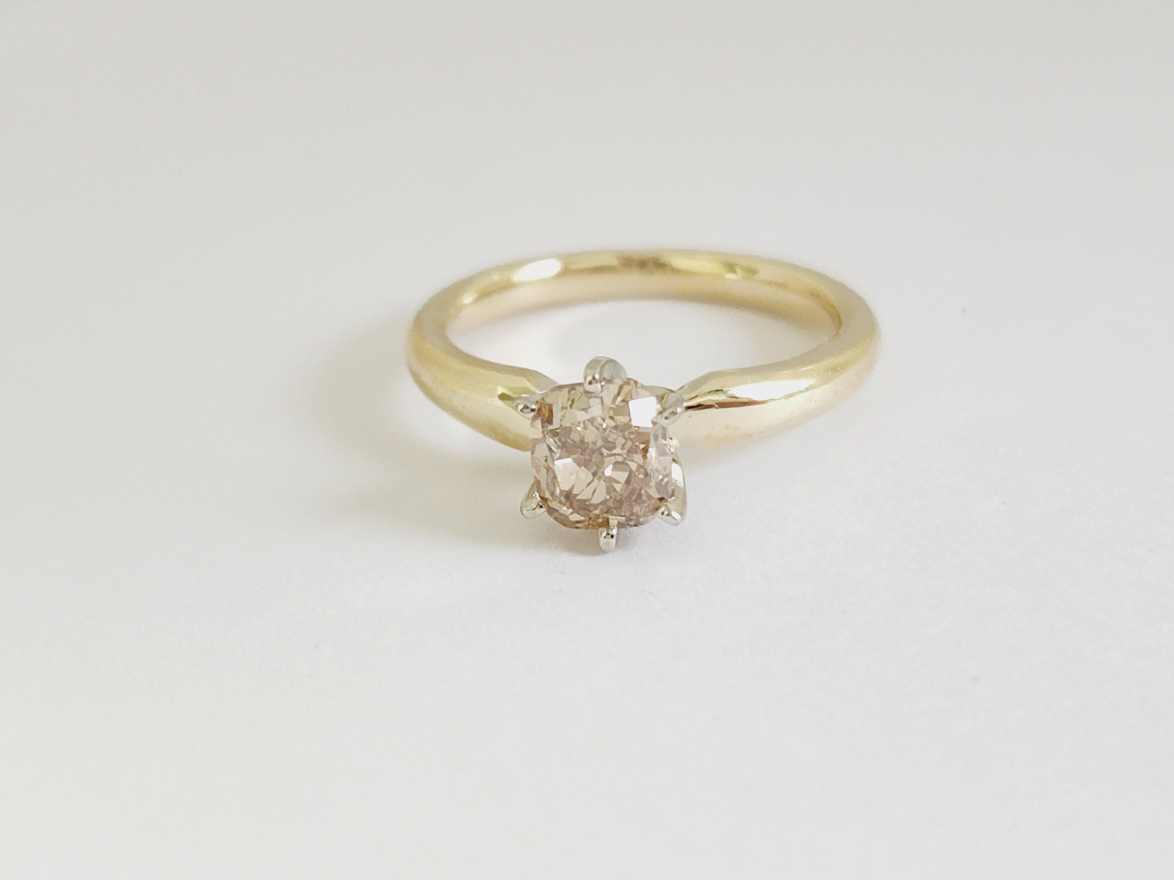 GIA 1.21 Carats cushion cut diamond set on a 6 prong Yellow gold 14 Karat solitaire Ring. 
Fancy Brown-Yellow, Clarity SI1
Ring Size 6.75