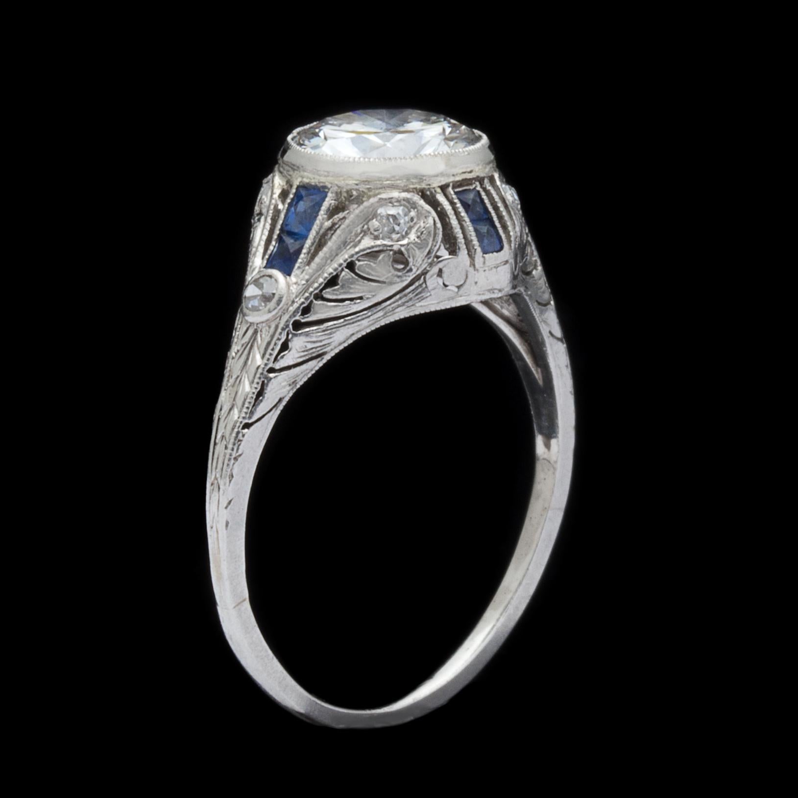 Round Cut 1.21 Carat Diamond and Sapphire Antique Engagement Ring For Sale