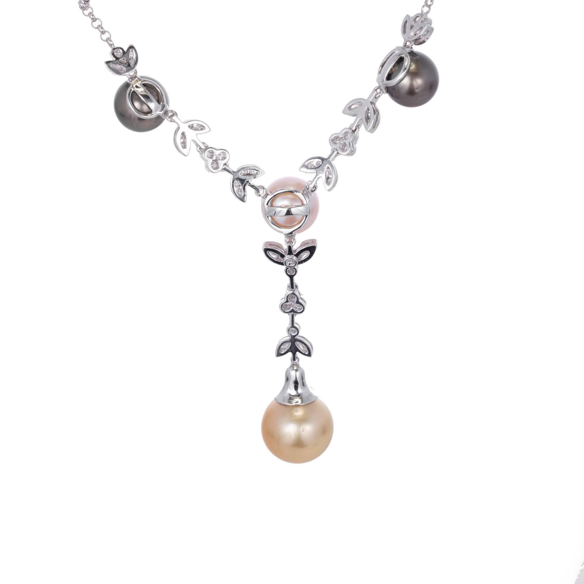 Diamond and South Sea Cultured Pearl drop necklace. In 18k white gold with bright sparkly full cut Diamond accents and black, pink and golden South Sea Cultured Pearls with good lustré and few blemishes.

18k white gold
81 round full cut Diamonds,