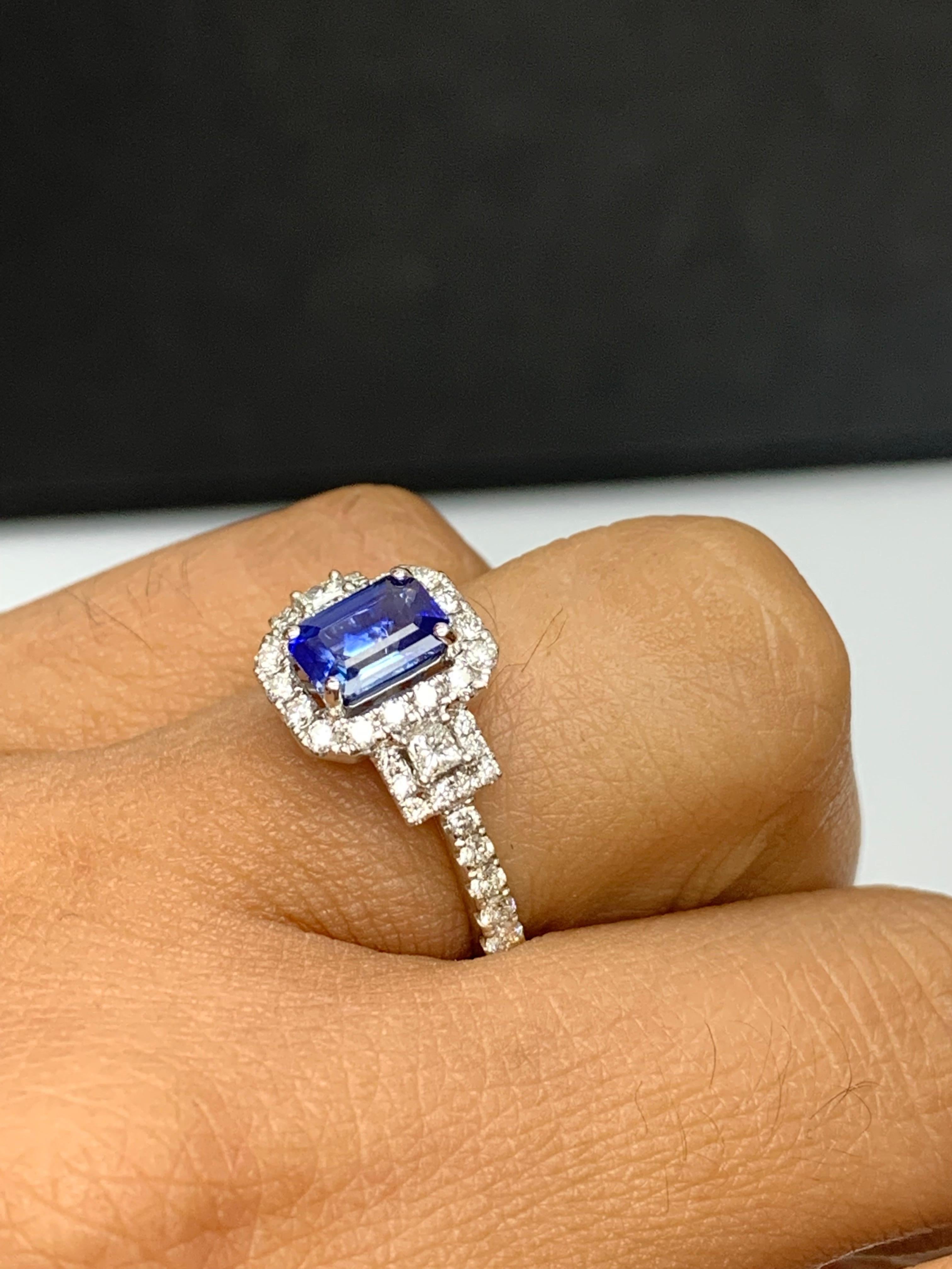 1.21 Carat Emerald Cut Blue Sapphire and Diamond Halo Ring in 18K White Gold In New Condition For Sale In NEW YORK, NY