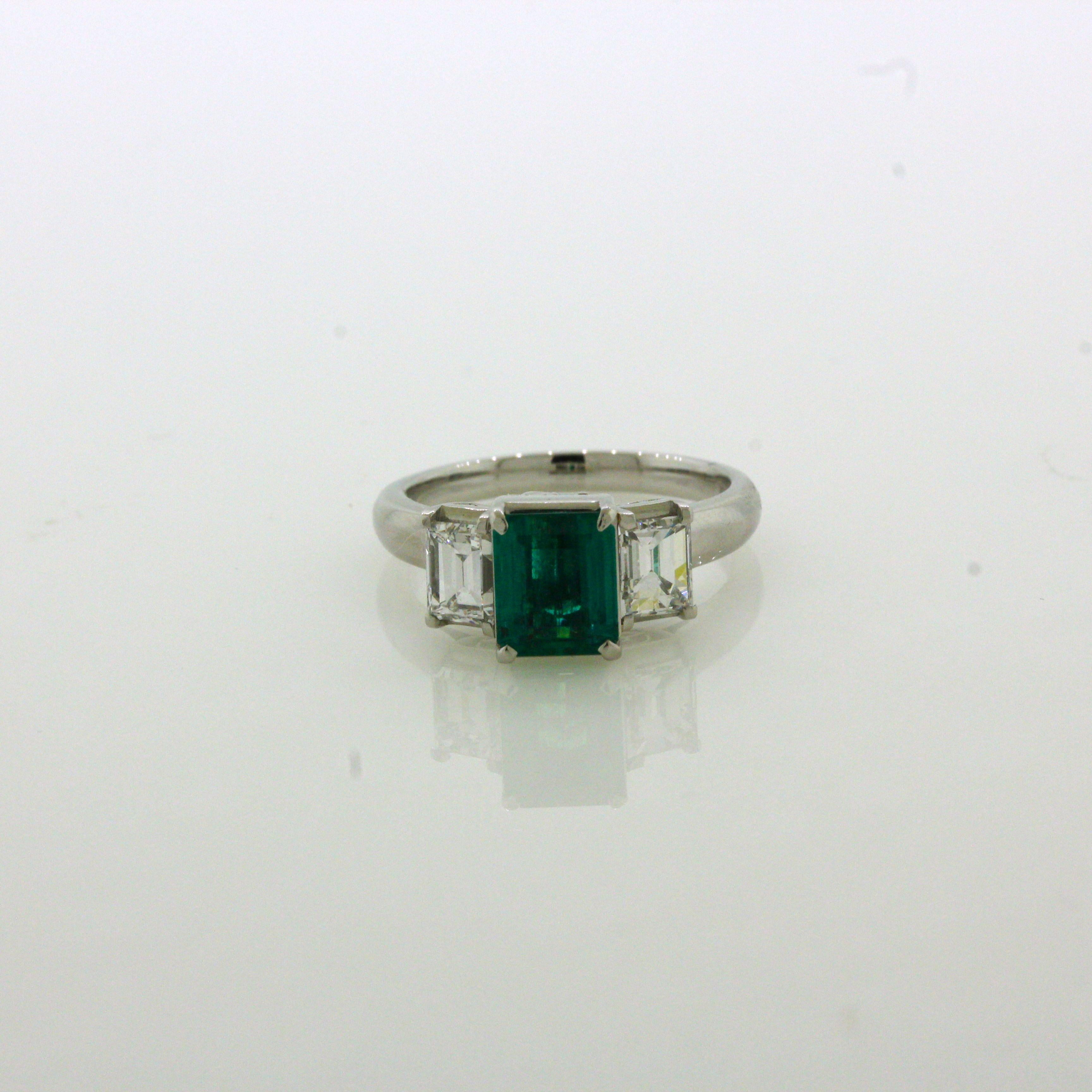 1.21 Carat Emerald Diamond 3-Stone Platinum Ring For Sale 1