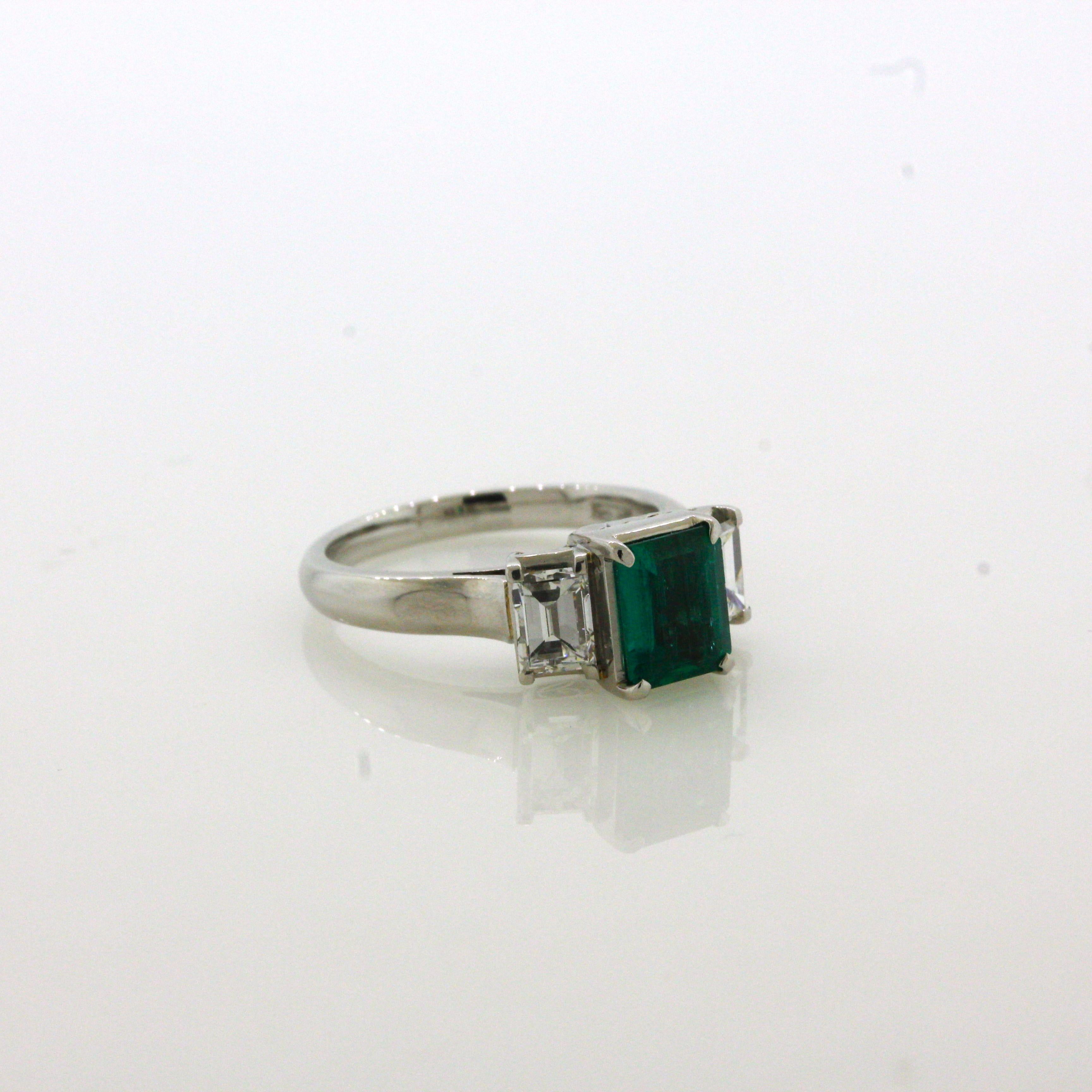 1.21 Carat Emerald Diamond 3-Stone Platinum Ring For Sale 2