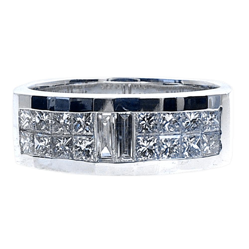 This Beautiful Gent's ring is made in 18K white gold with shiny finish. It has 16 pieces of perfectly matched 2.1 mm princess cut and 2 pieces of straight Baguette Diamonds(Total Weight 1.21 Ct) invisible set on the top with a square shank. 
Total