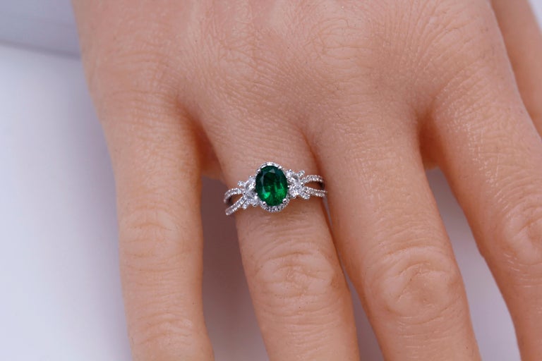 Women's 1.21 Carat Oval Cut Fine Emerald and 0.64 Carat Diamond Ring in 18k White Gold For Sale