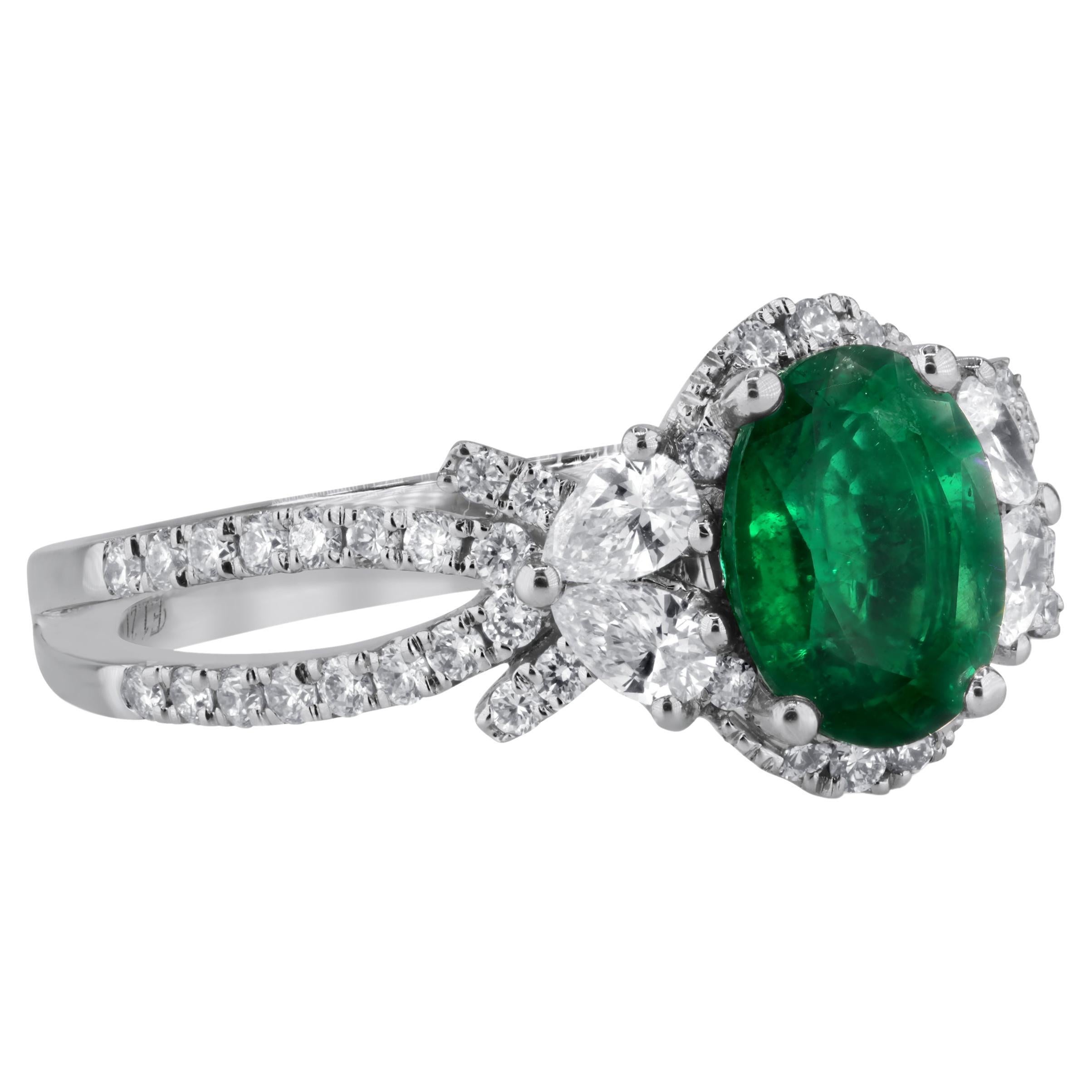 1.21 Carat Oval Cut Fine Emerald and 0.64 Carat Diamond Ring in 18k White Gold
