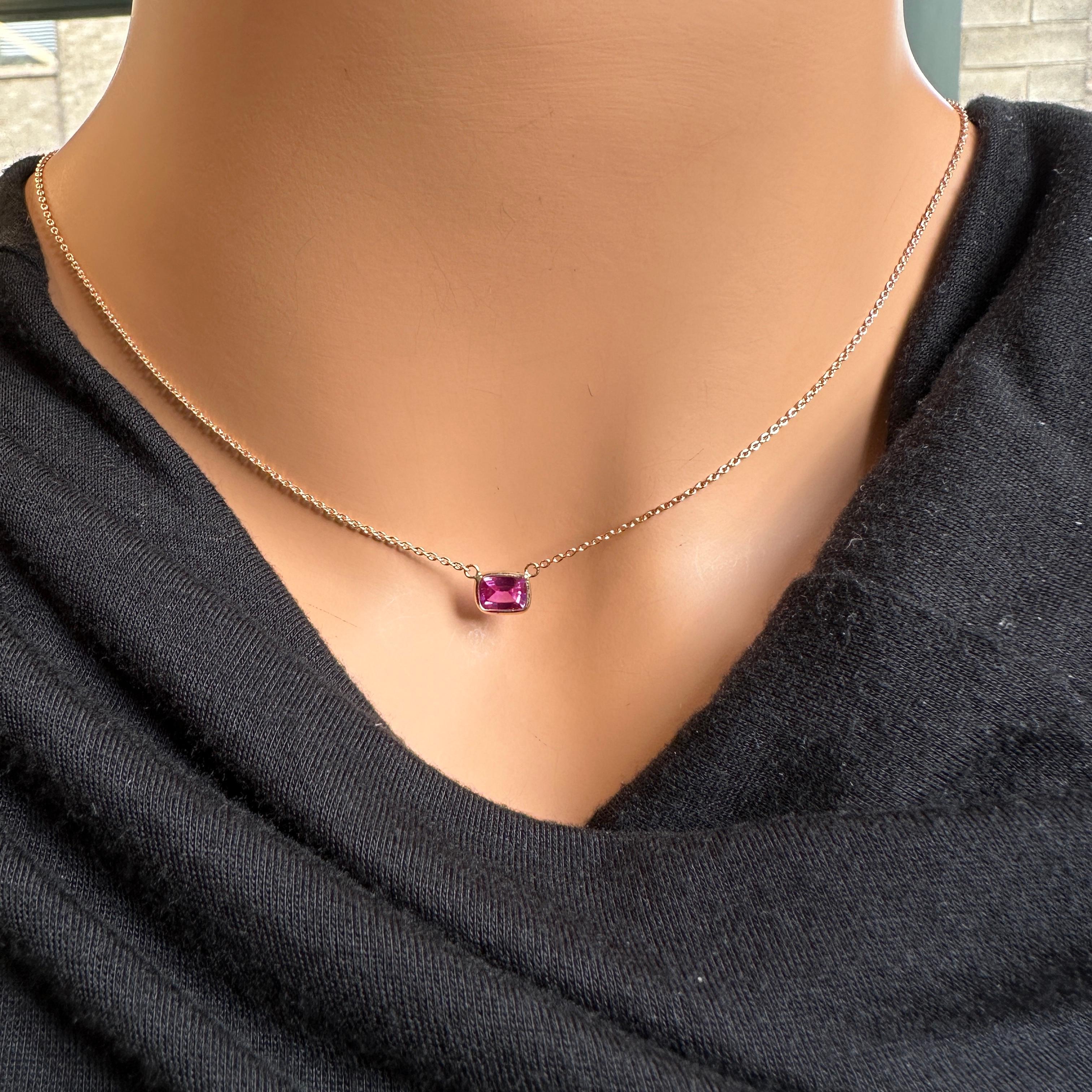 A fashion necklace made of 14k rose gold with a main stone of a cushion-cut pink sapphire weighing 1.21 carats and certified would be a beautiful and elegant choice. Pink sapphires are known for their delicate and romantic color, and the cushion cut
