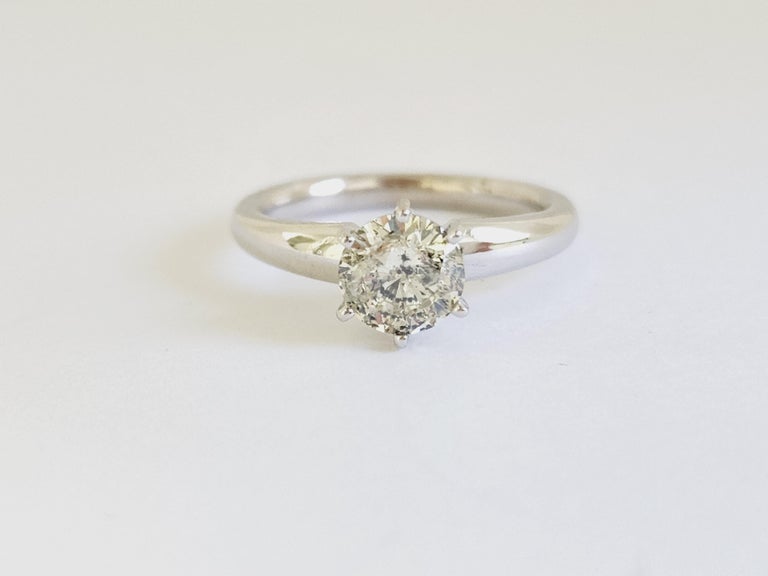 1.21 ct round brilliant cut natural diamonds. 6 prong solitaire setting, set in 14k white gold. Ring Size 6.75.