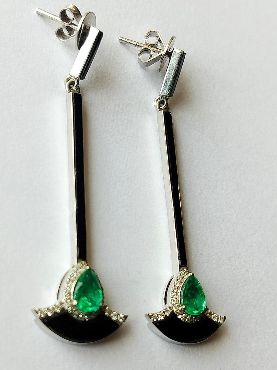 Pear Cut 1.21 carats Natural Emerald, Black Enamel & Diamonds Chandelier Earrings For Sale