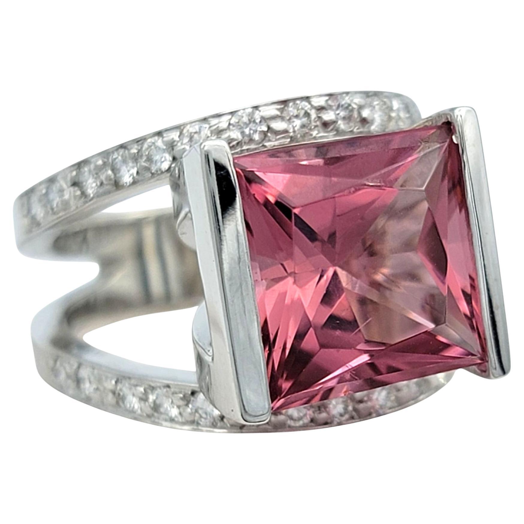 Approximate Ring Size:  7 (Due to the oval shape of the the band, ring size has been approximated as it does not fit securely on a mandrel) 

Make a bold statement with this striking pink tourmaline and diamond ring, crafted in 14 karat white gold.
