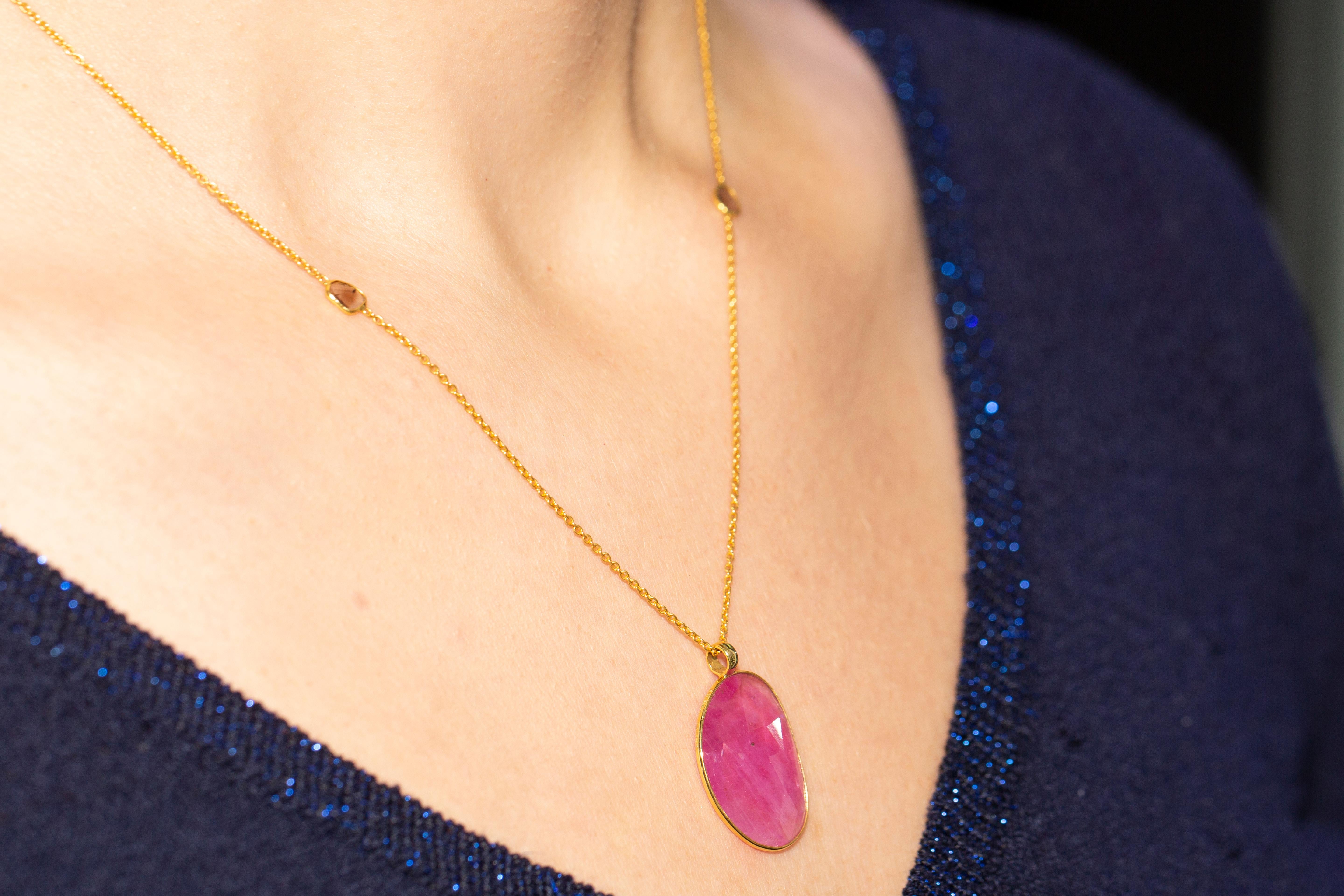 This stunning timelessly elegant rose cut 11.95 Carat Ruby from the Artisan collection is set in luxurious 18 Karat Yellow Gold chain featuring a total of 0.15 Carat Diamond slices. Each piece is hand made with a unique shaped precious stone in the