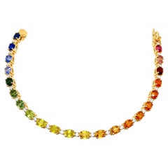 Armband mit natürlichen Saphiren (insgesamt 12,10 Karat) und einem Diamanten (0,70 Karat, HI VS) aus 14-karätigem Gold
