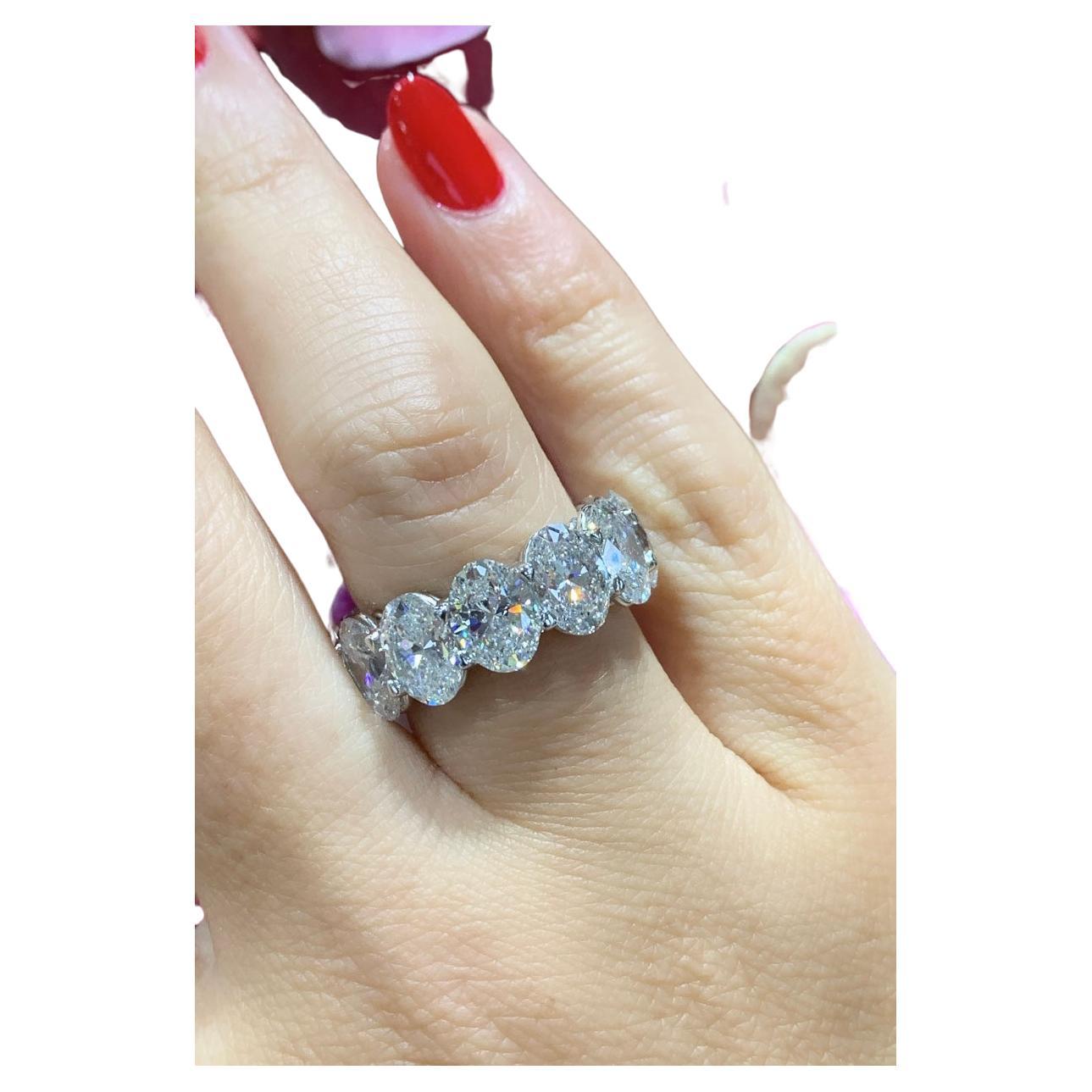 Oval cut diamond eternity band is absolutely amazingly crafted in luxurious Platinum and made with 12 oval cut diamonds of each GIA certified stone 12.10carats! True fit for a queen. Everyone will gasp with thrill when seeing it on her hand.
Metal: