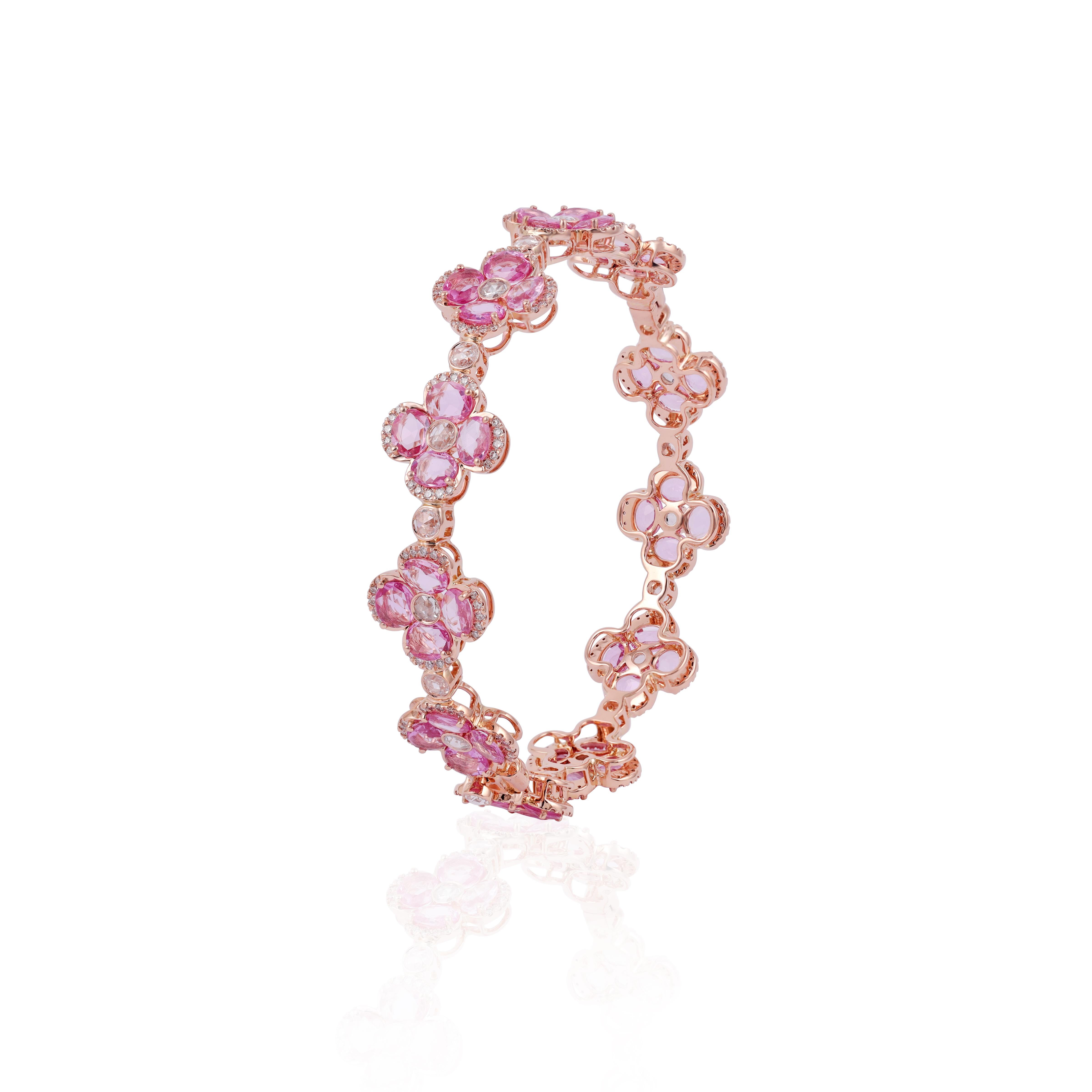 12.11 Carat Pink Sapphire
 and Diamond  Bracelet in 18K Rose Gold

This magnificent Oval shape Pink Sapphire Flower Bangle is incredulous. The solitaire Oval-shaped Oval-cut sapphires are beautifully With Single Rose cut Diamonds & Small Diamond