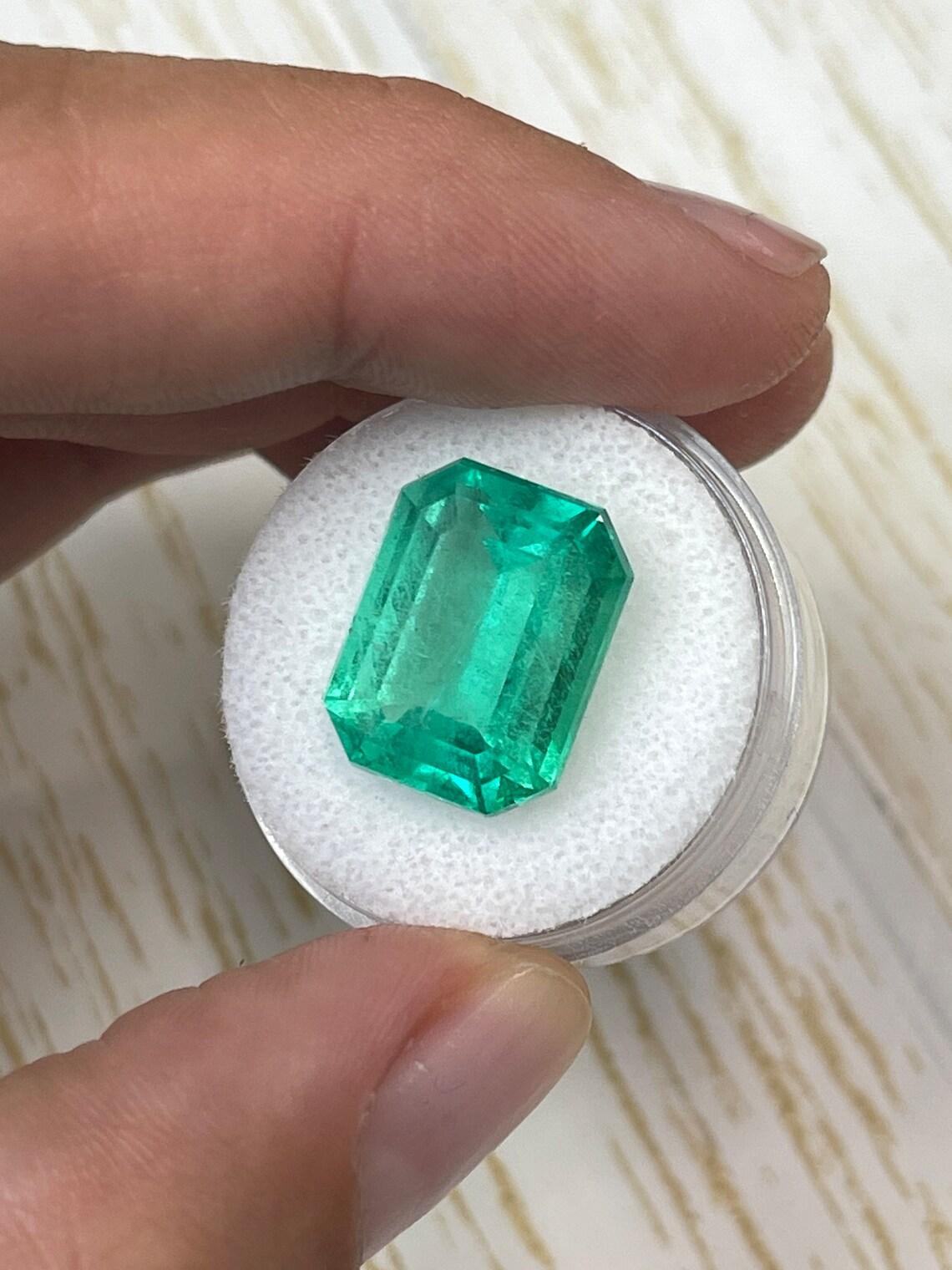 Modern 12.11ct GIA Certified Yellowish Green Emerald Cut Gem 16x12 Genuine May For Sale