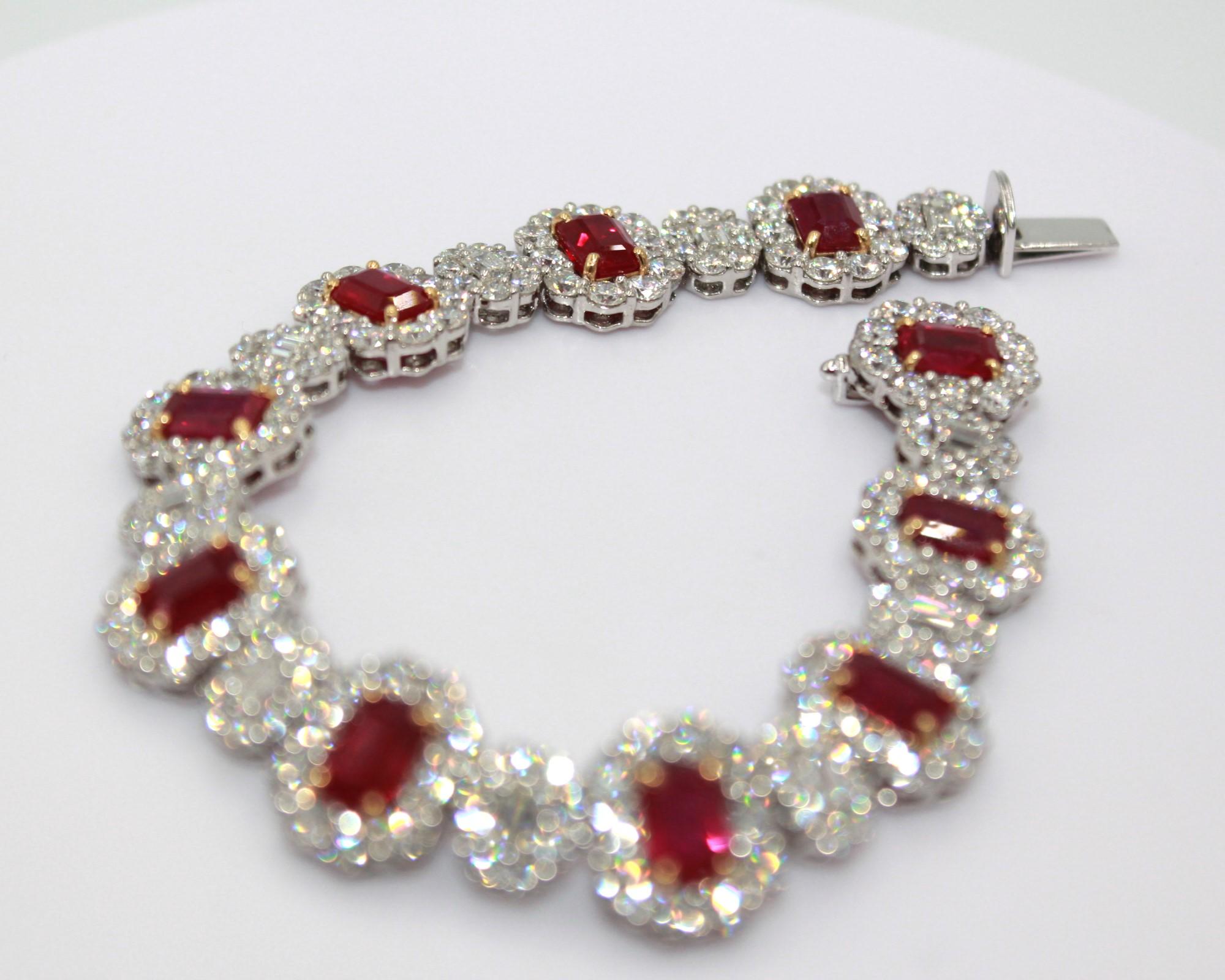12.12 carats emerald-cut Burma Ruby with totaling a diamond weight of 13.58 carats. 

This stunning Ruby & Diamond Bracelet will highlight your uniqueness and elegance. 

Item Details:
- Type: Bracelet
- Metal: Platinum 

Color Stone Details:
-