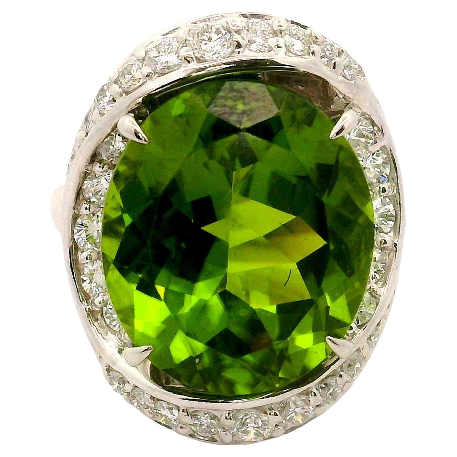 Anello a spirale con diamante peridoto in platino da 12,12 carati